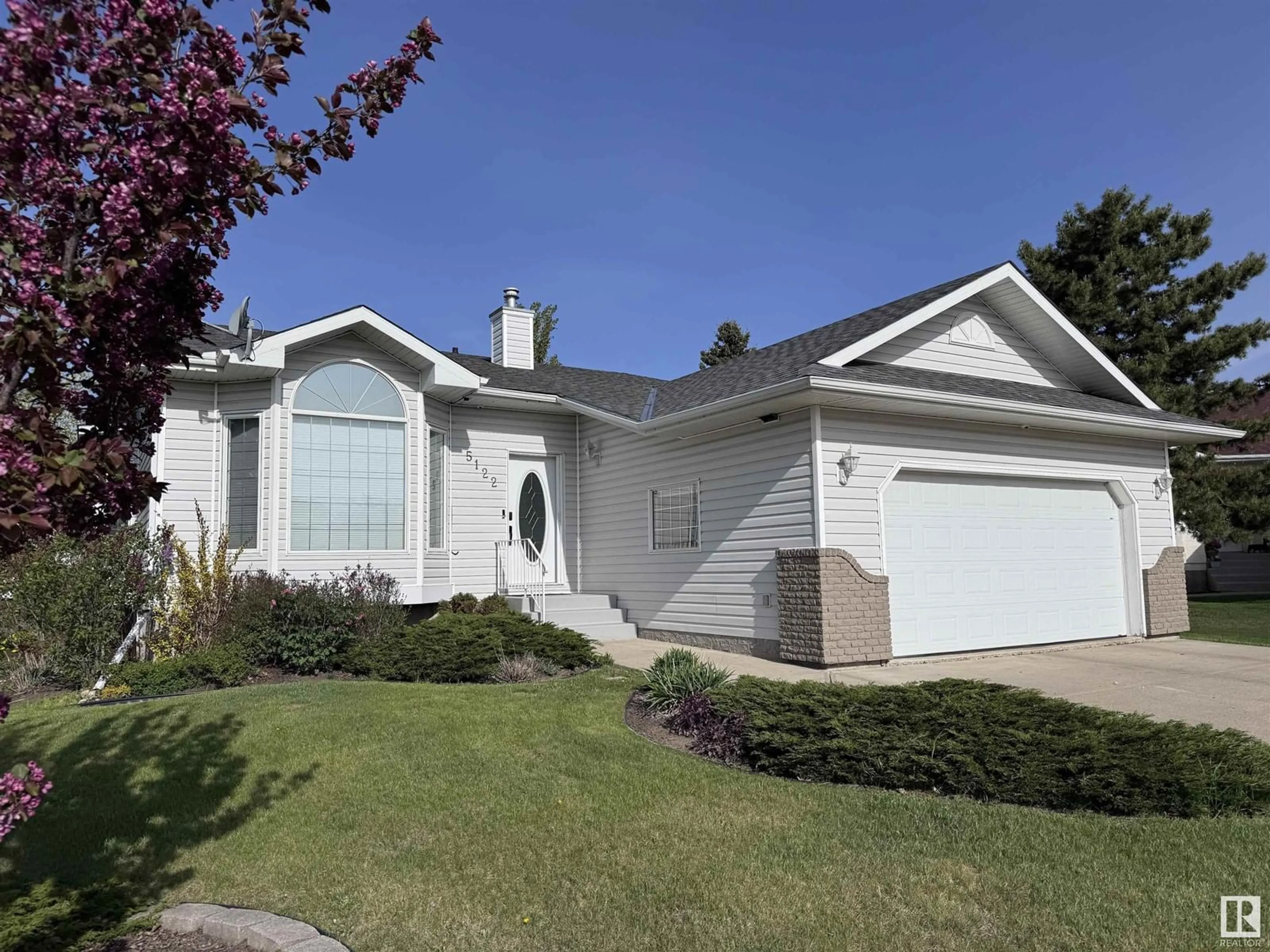 Home with vinyl exterior material, street for 5122 52 AV, Legal Alberta T0G1L0