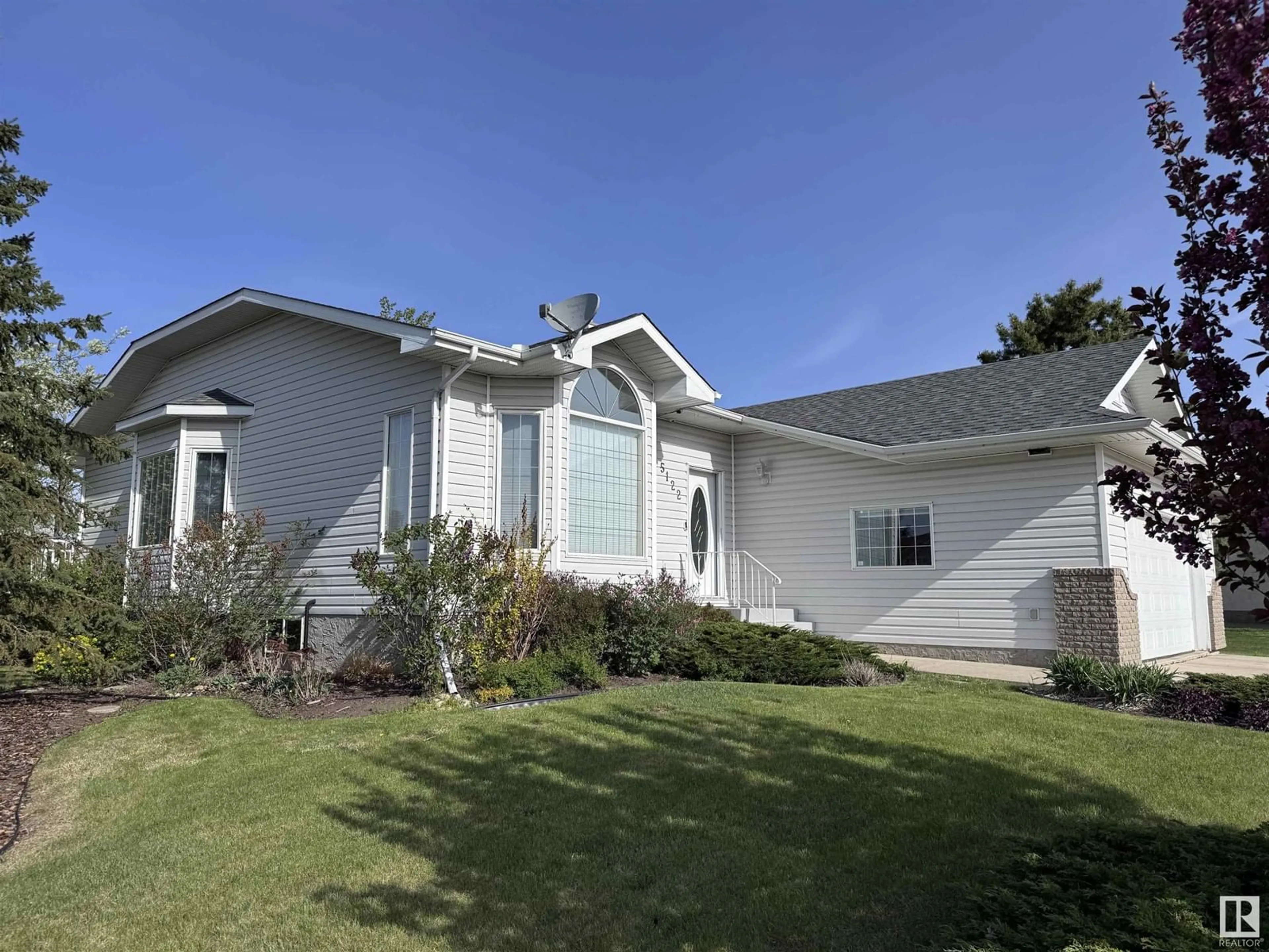 Home with vinyl exterior material, street for 5122 52 AV, Legal Alberta T0G1L0