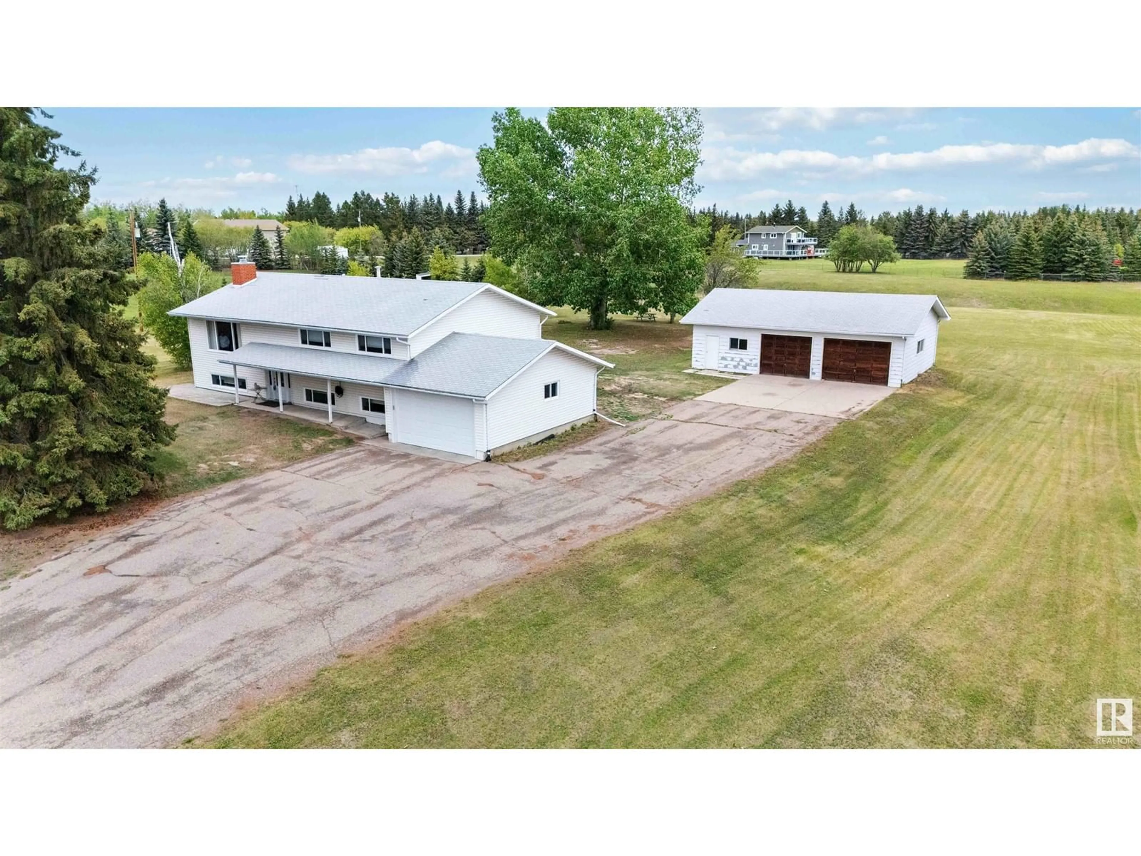 A pic from outside/outdoor area/front of a property/back of a property/a pic from drone, building for 23516 - 19 TWP RD 560, Rural Sturgeon County Alberta T0A0K4