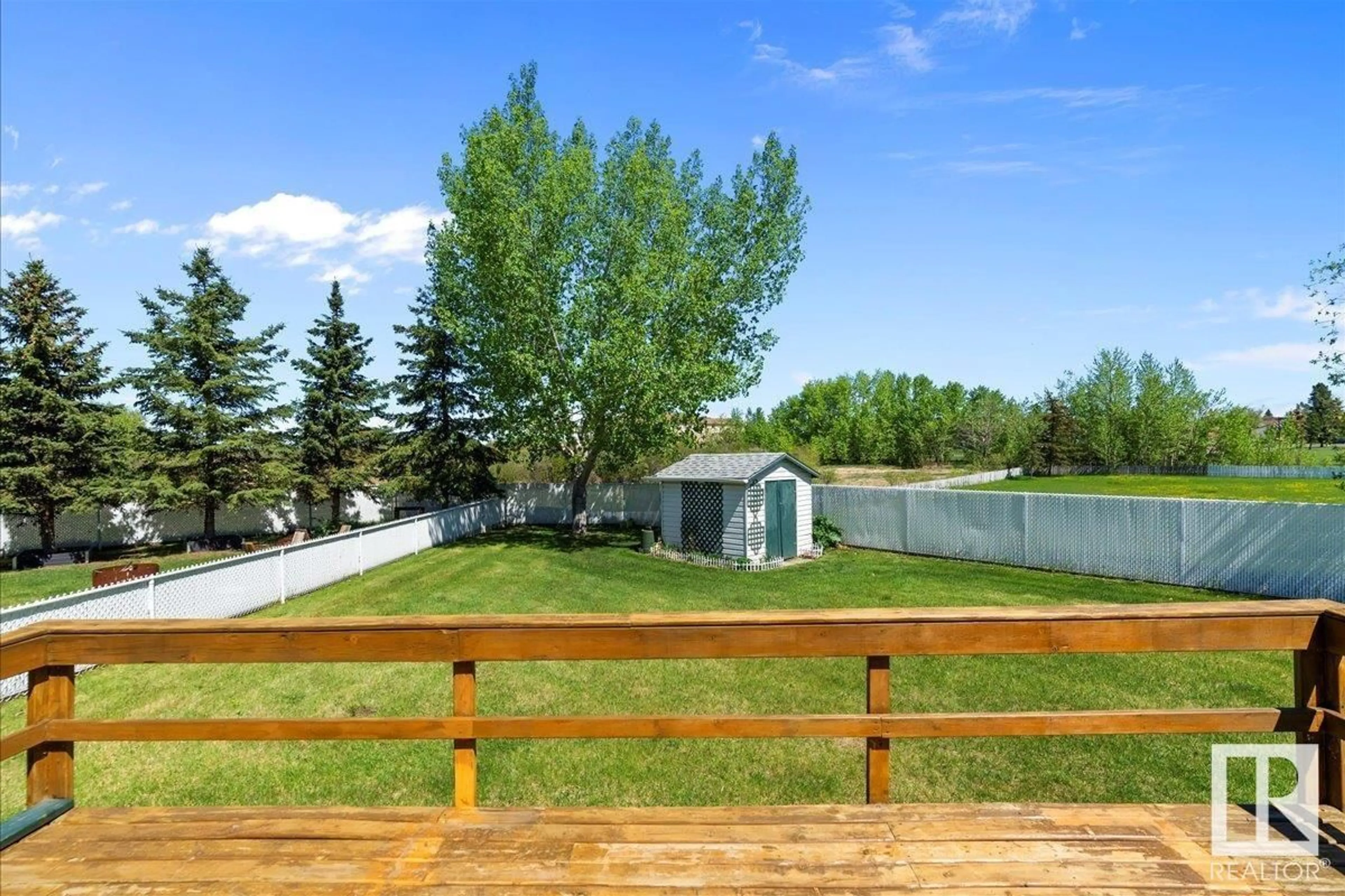 A pic from outside/outdoor area/front of a property/back of a property/a pic from drone, mountain view for 8 - 5202 58 AV, Tofield Alberta T0B4J0