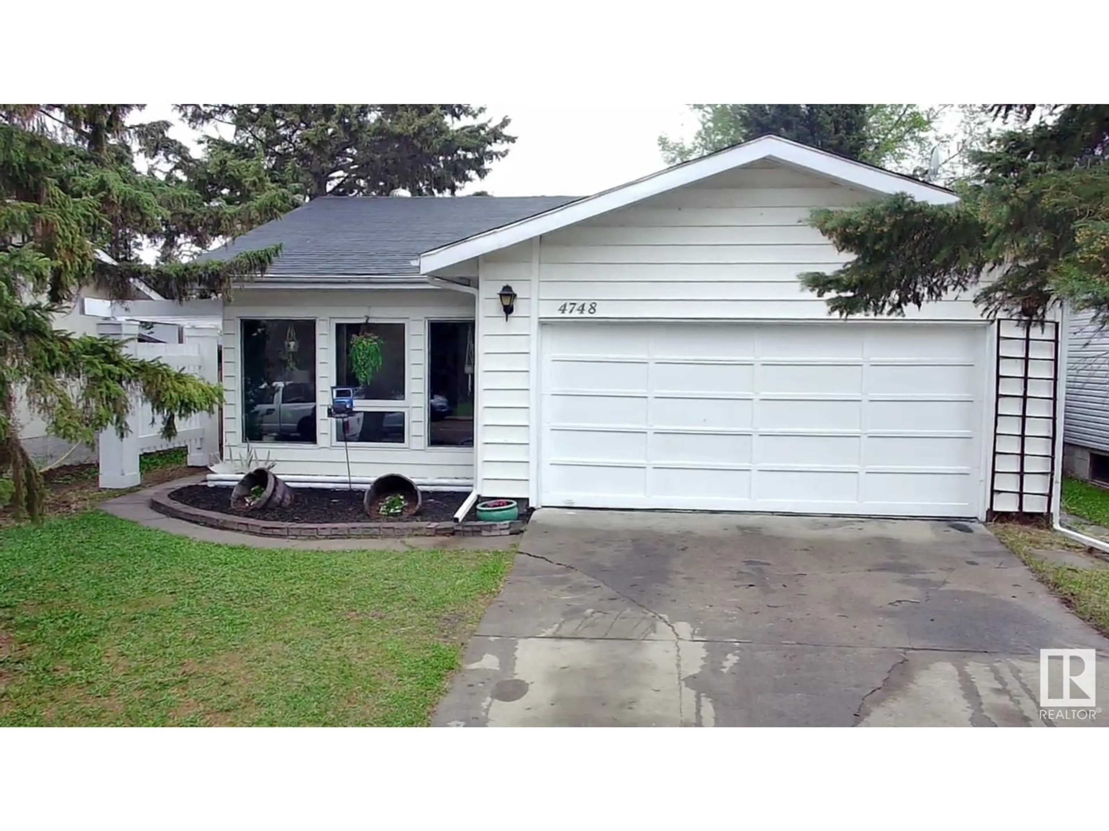 Home with vinyl exterior material, street for 4748 56 AVE, Tofield Alberta T0B4J0