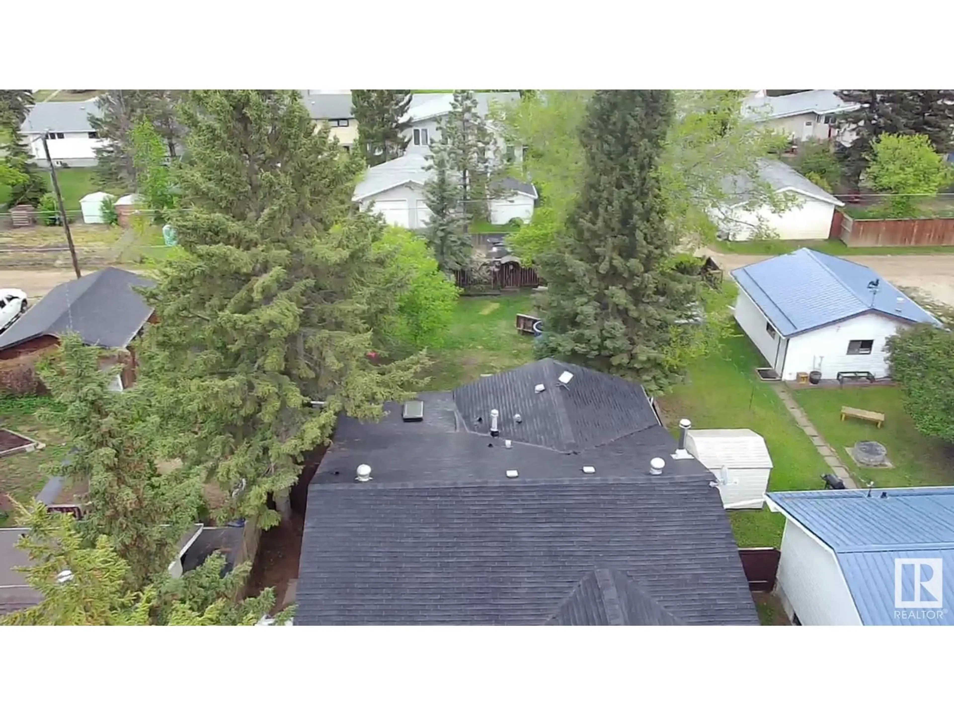 A pic from outside/outdoor area/front of a property/back of a property/a pic from drone, unknown for 4748 56 AVE, Tofield Alberta T0B4J0