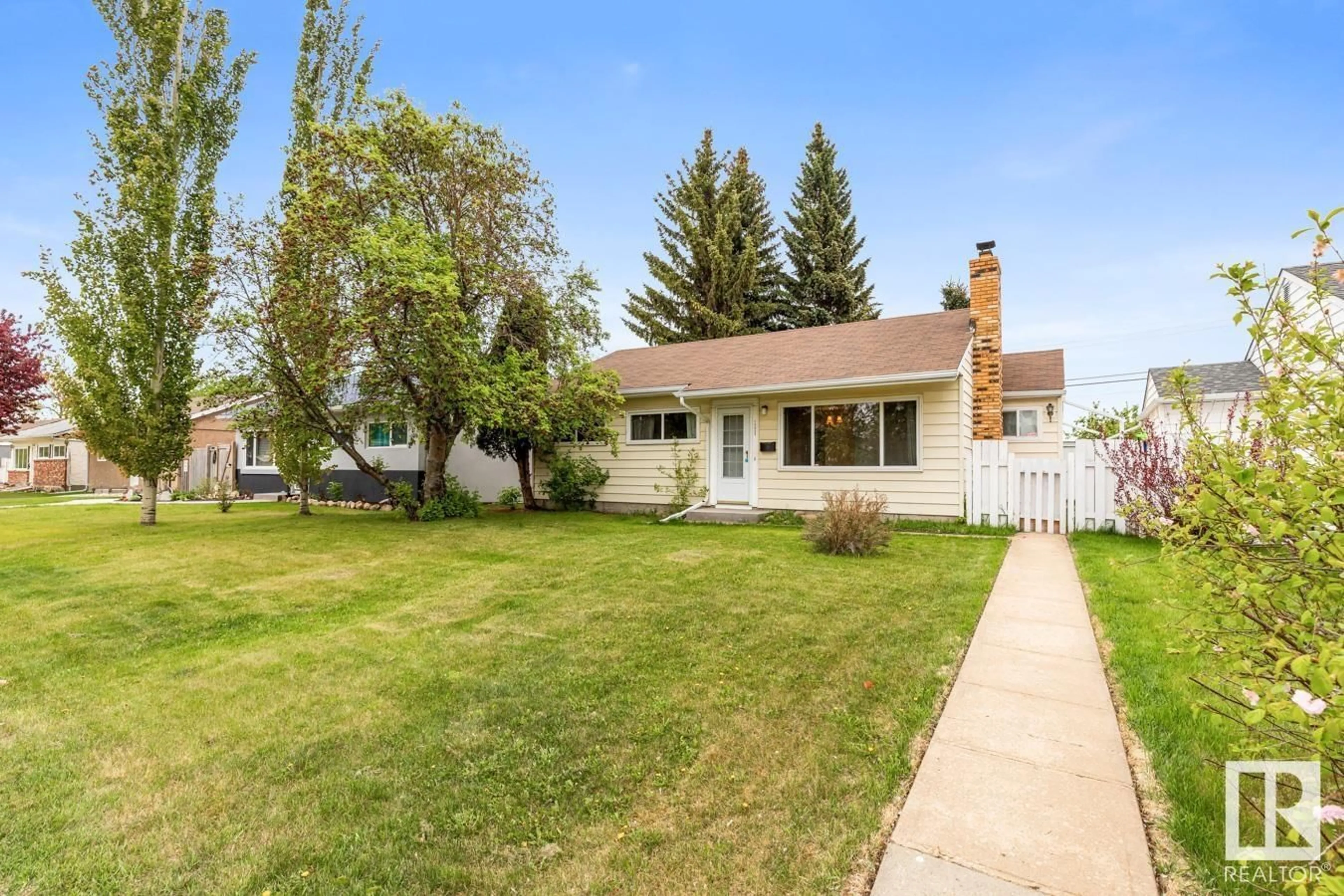 Home with vinyl exterior material, street for 15925 108 AV, Edmonton Alberta T5P1A8