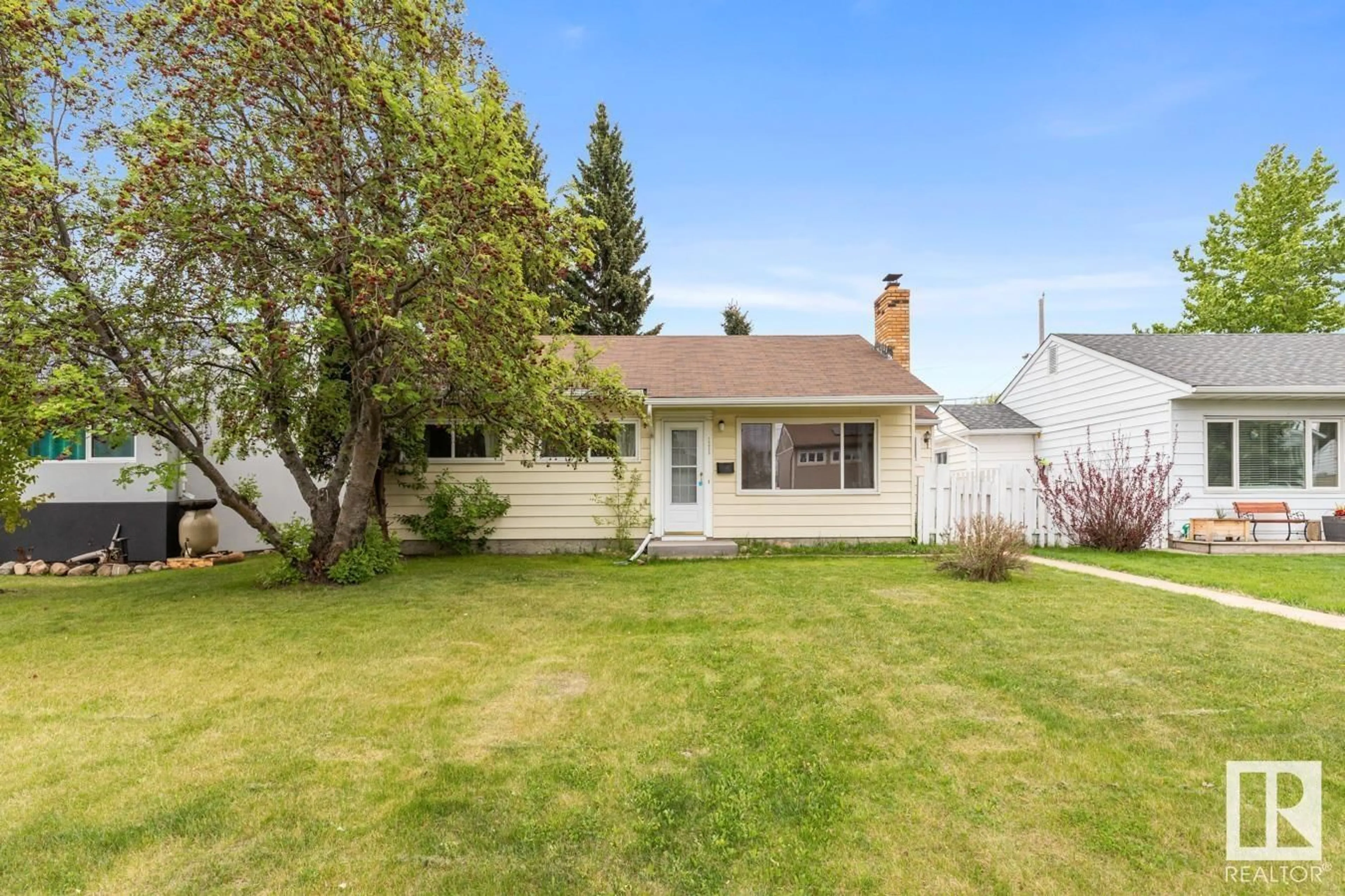 Home with vinyl exterior material, street for 15925 108 AV, Edmonton Alberta T5P1A8