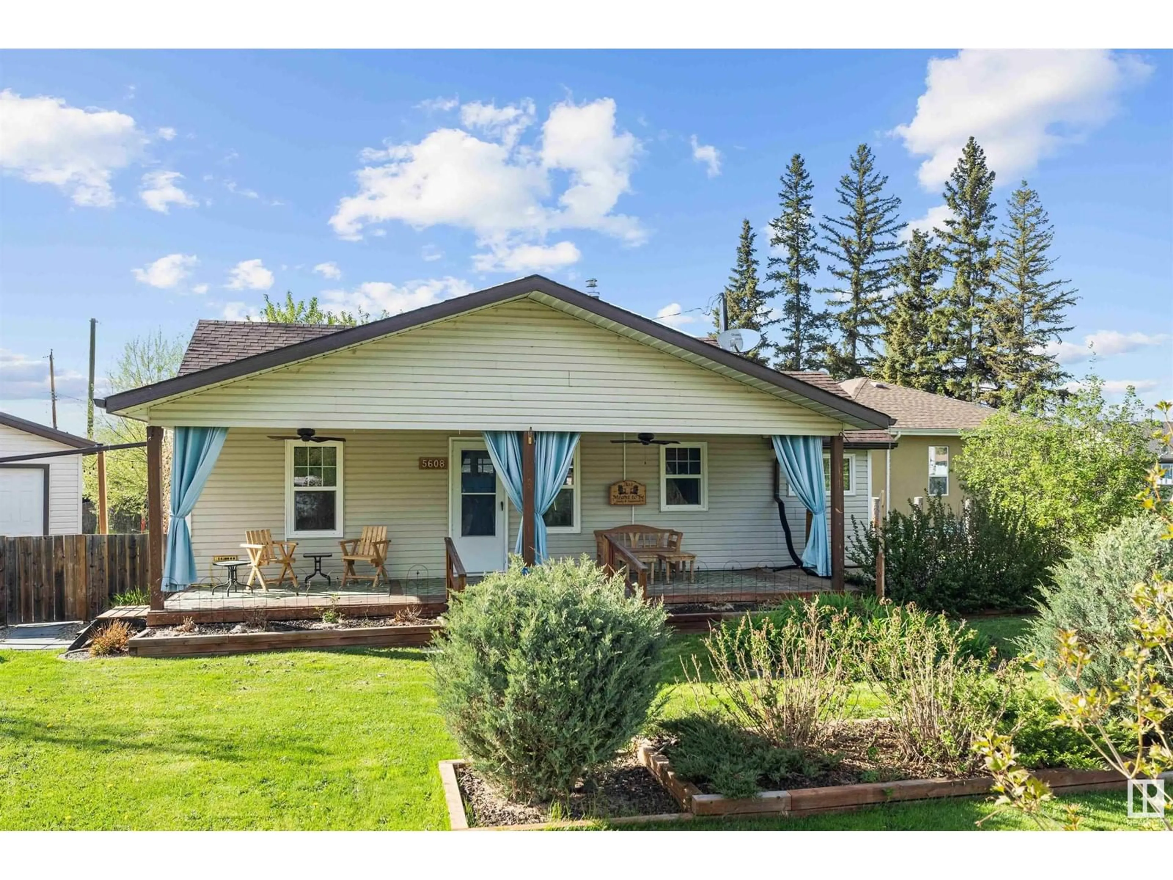 Home with vinyl exterior material, street for 5608 49 AV, Rural Lac Ste. Anne County Alberta T0E0A0