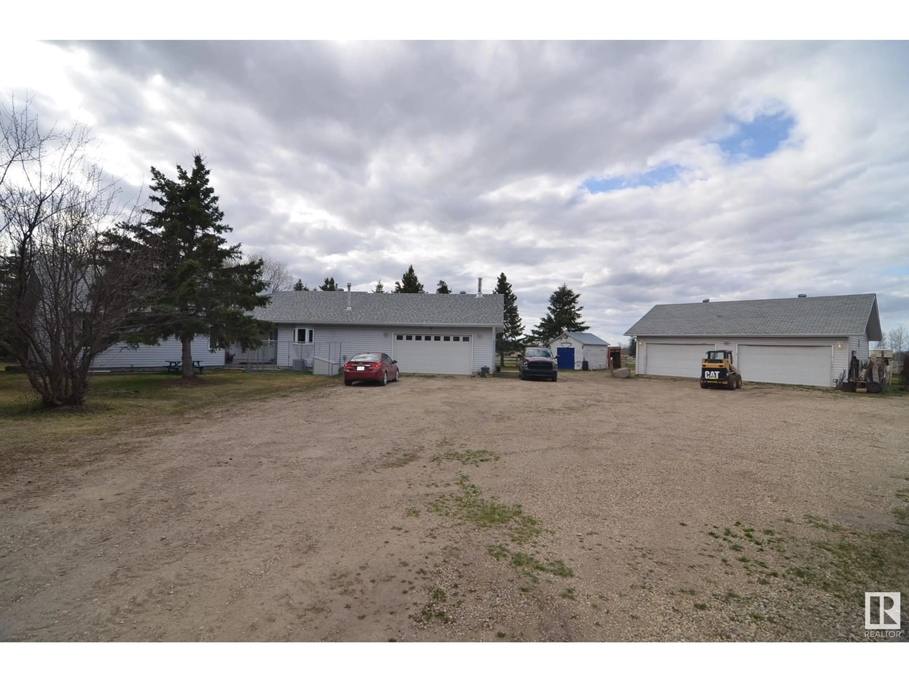 A pic from outside/outdoor area/front of a property/back of a property/a pic from drone, unknown for 55428 HWY 763, Rural Lac Ste. Anne County Alberta T0E0J0