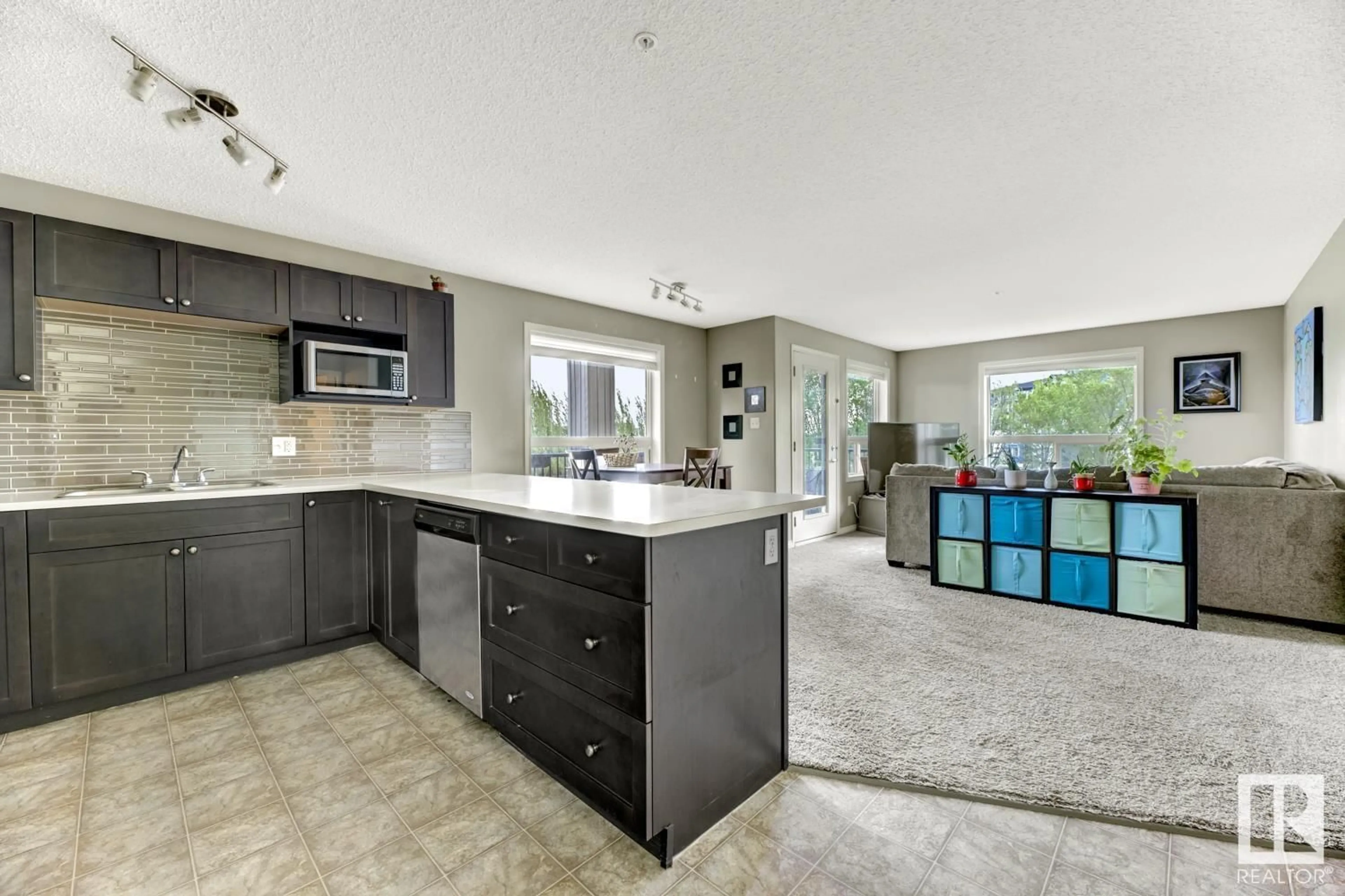 Open concept kitchen, ceramic/tile floor for #207 - 1520 HAMMOND GATE, Edmonton Alberta T6M0J4