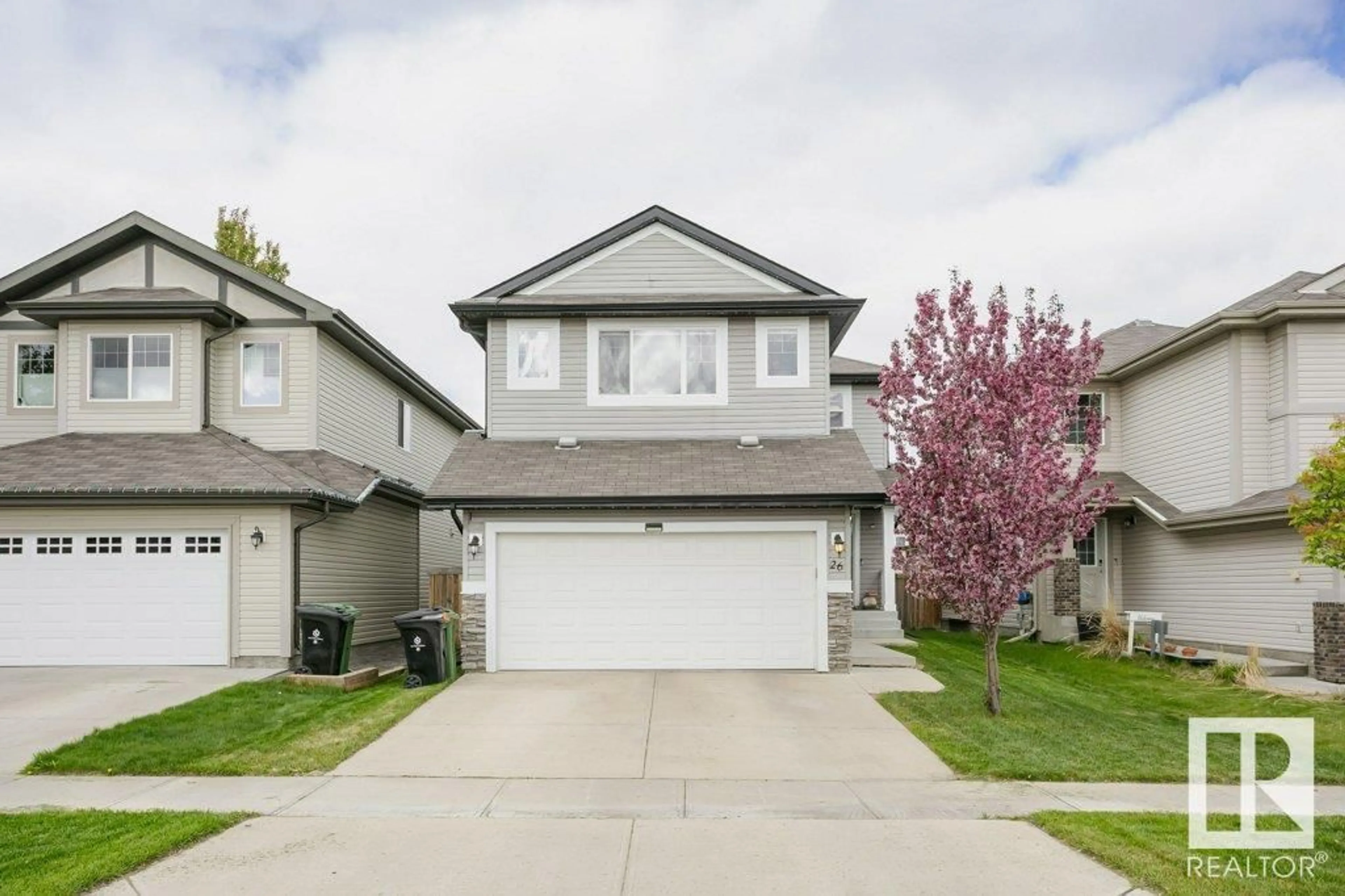 Home with vinyl exterior material, street for 26 NAVAJO LN, Fort Saskatchewan Alberta T8L0J6