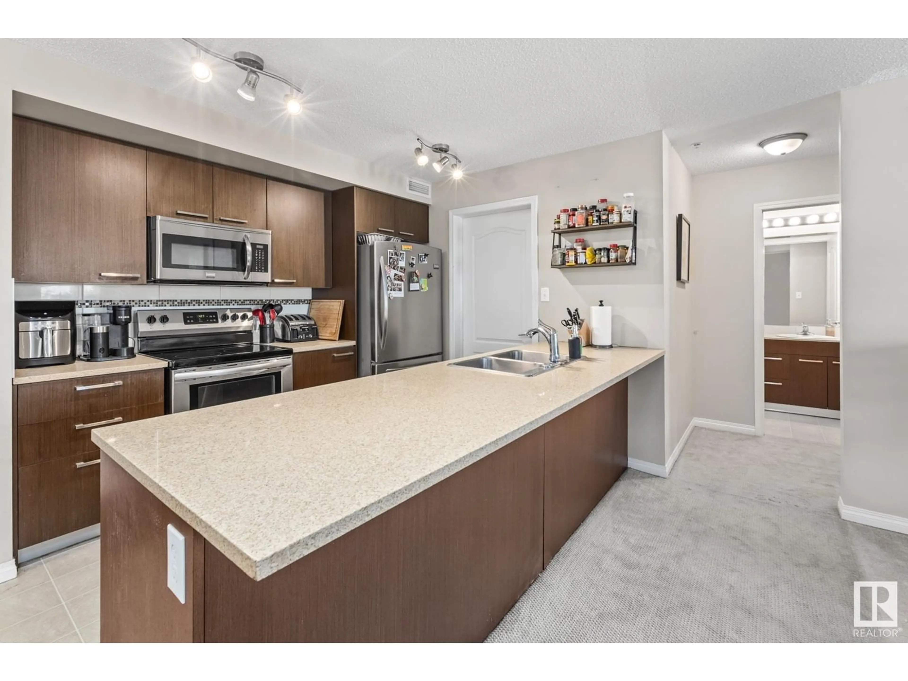 Open concept kitchen, unknown for 2301 7343 SOUTH TERWILLEGAR DR, Edmonton Alberta T6R0M2