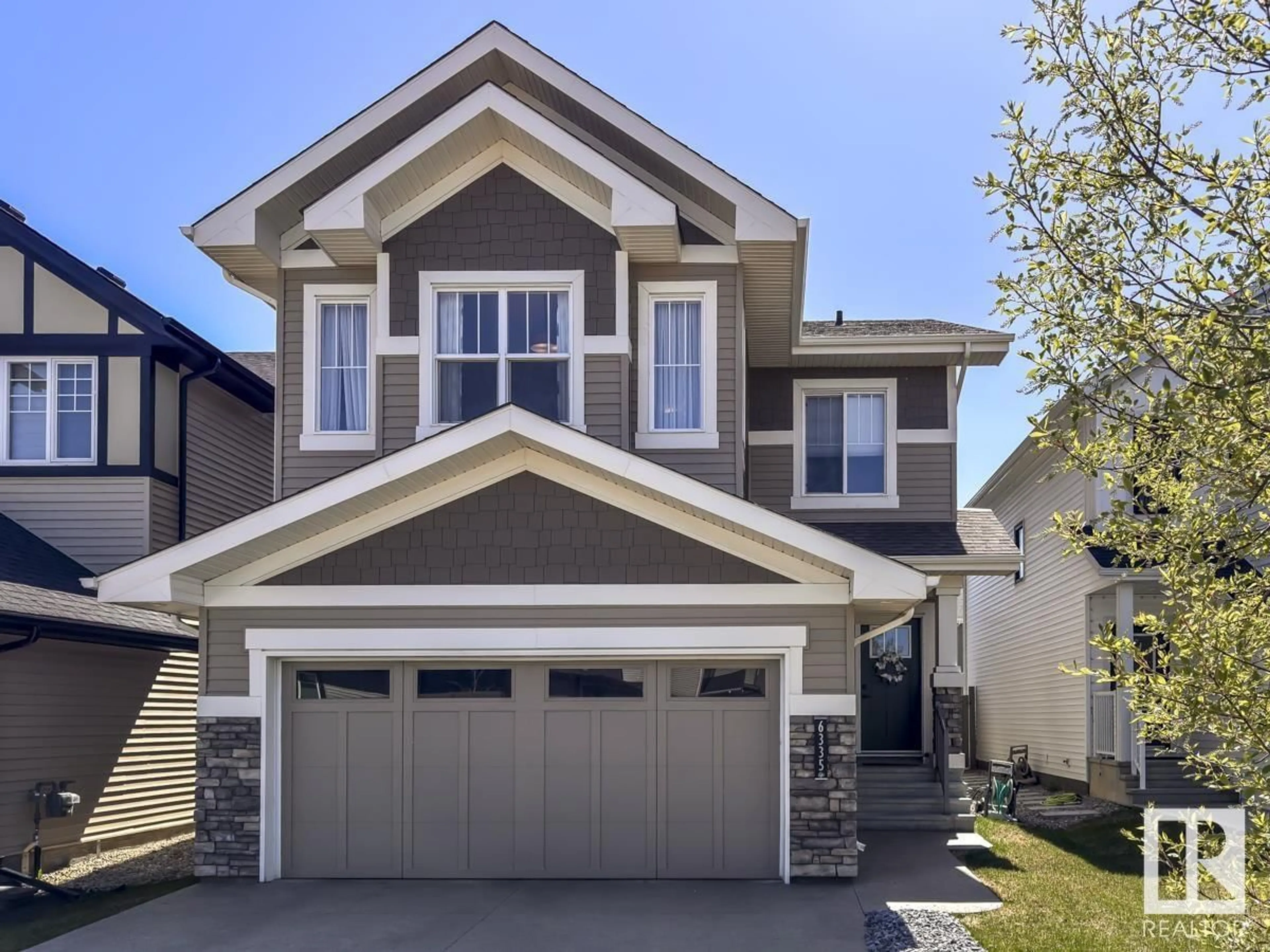 Home with vinyl exterior material, street for 6335 CRAWFORD LINK, Edmonton Alberta T6W3Y6