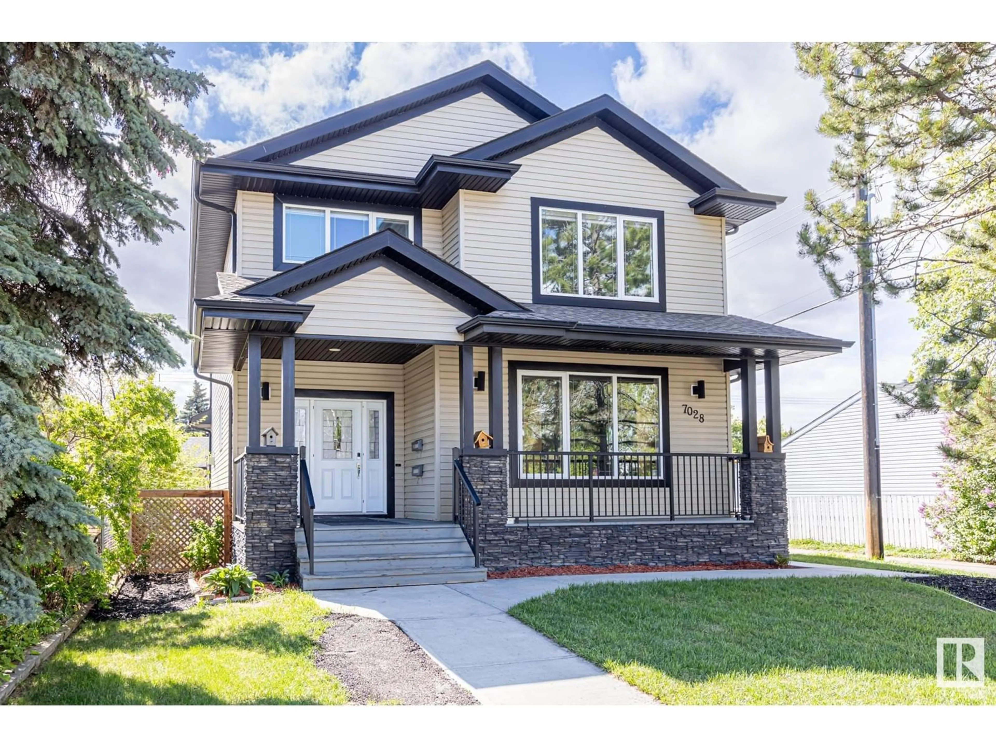 Home with vinyl exterior material, street for 7028 81 ST, Edmonton Alberta T6C2T4
