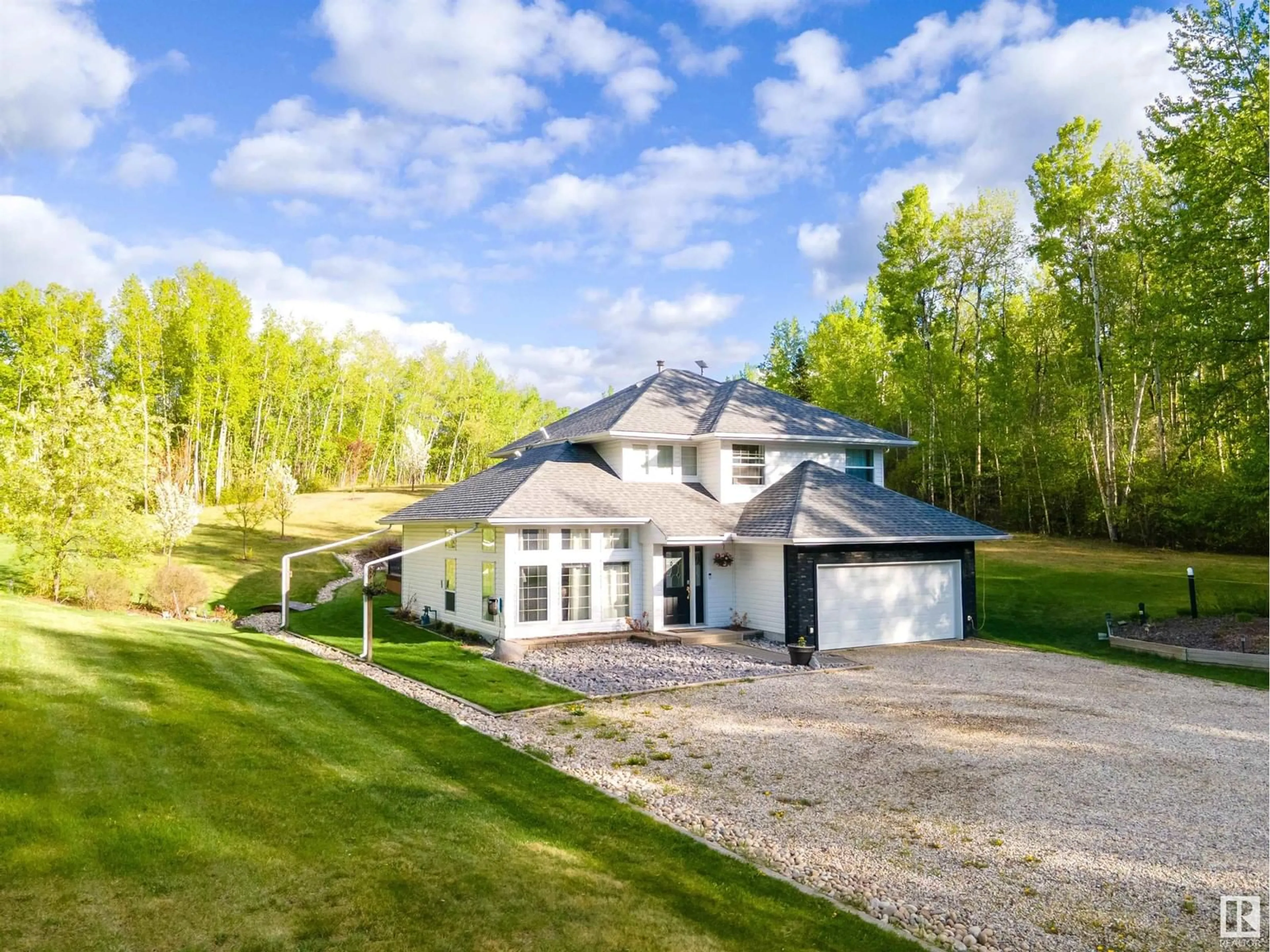 A pic from outside/outdoor area/front of a property/back of a property/a pic from drone, unknown for 220 54130 RGE ROAD 12, Rural Parkland County Alberta T7Y0A5