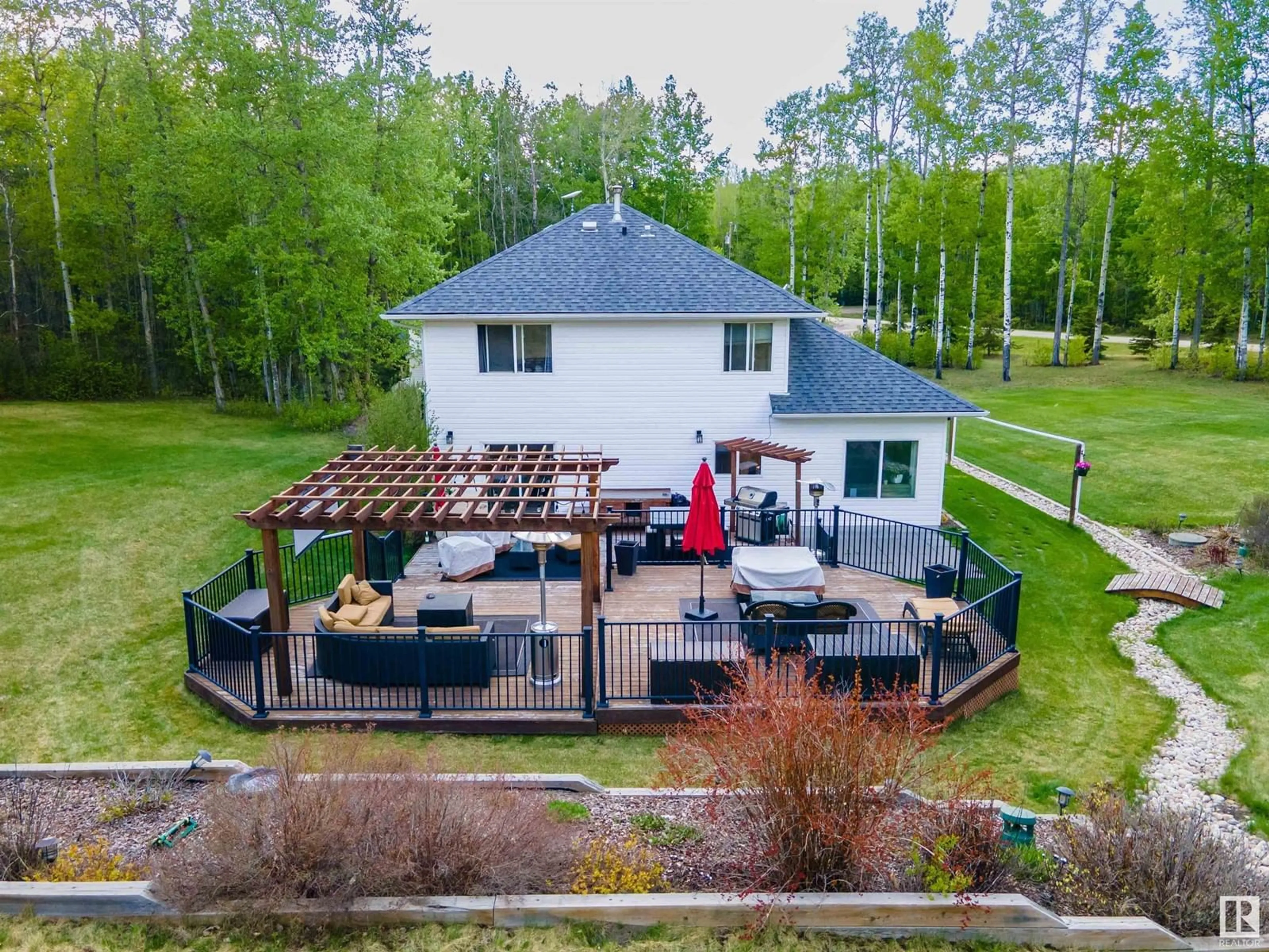 A pic from outside/outdoor area/front of a property/back of a property/a pic from drone, water/lake/river/ocean view for 220 54130 RGE ROAD 12, Rural Parkland County Alberta T7Y0A5