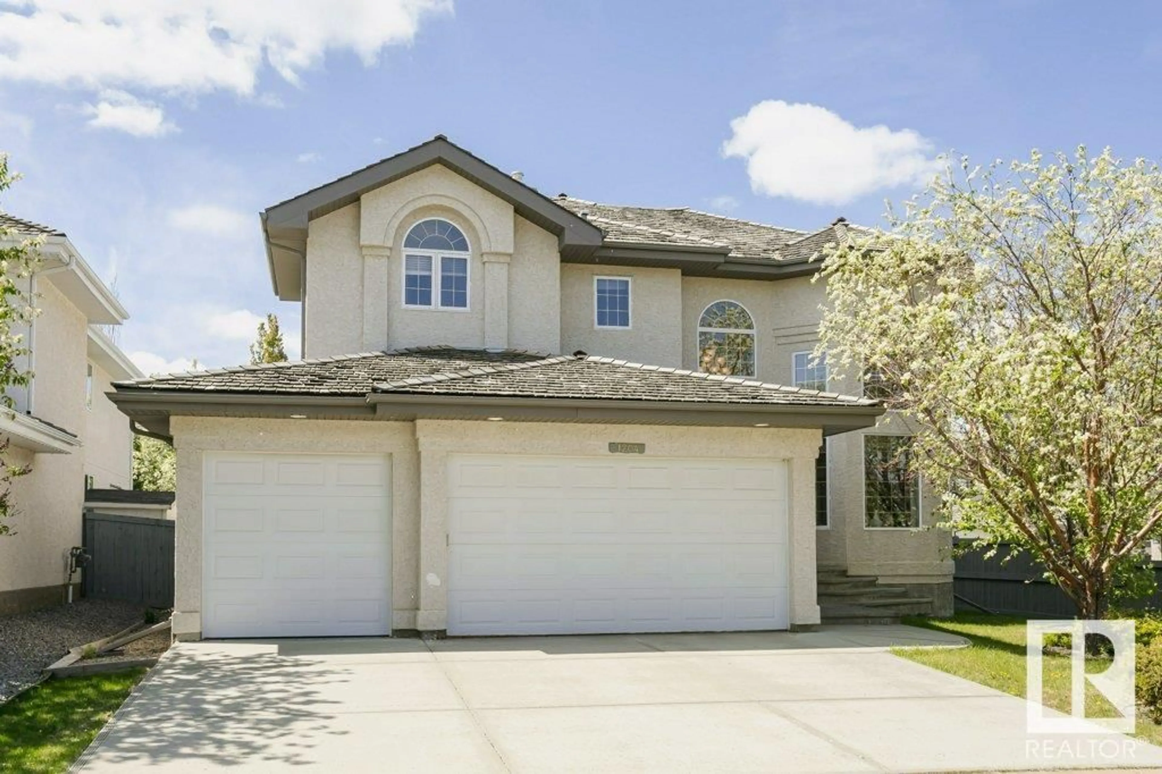 Home with vinyl exterior material, street for 1204 DECKER WY, Edmonton Alberta T6M2V5