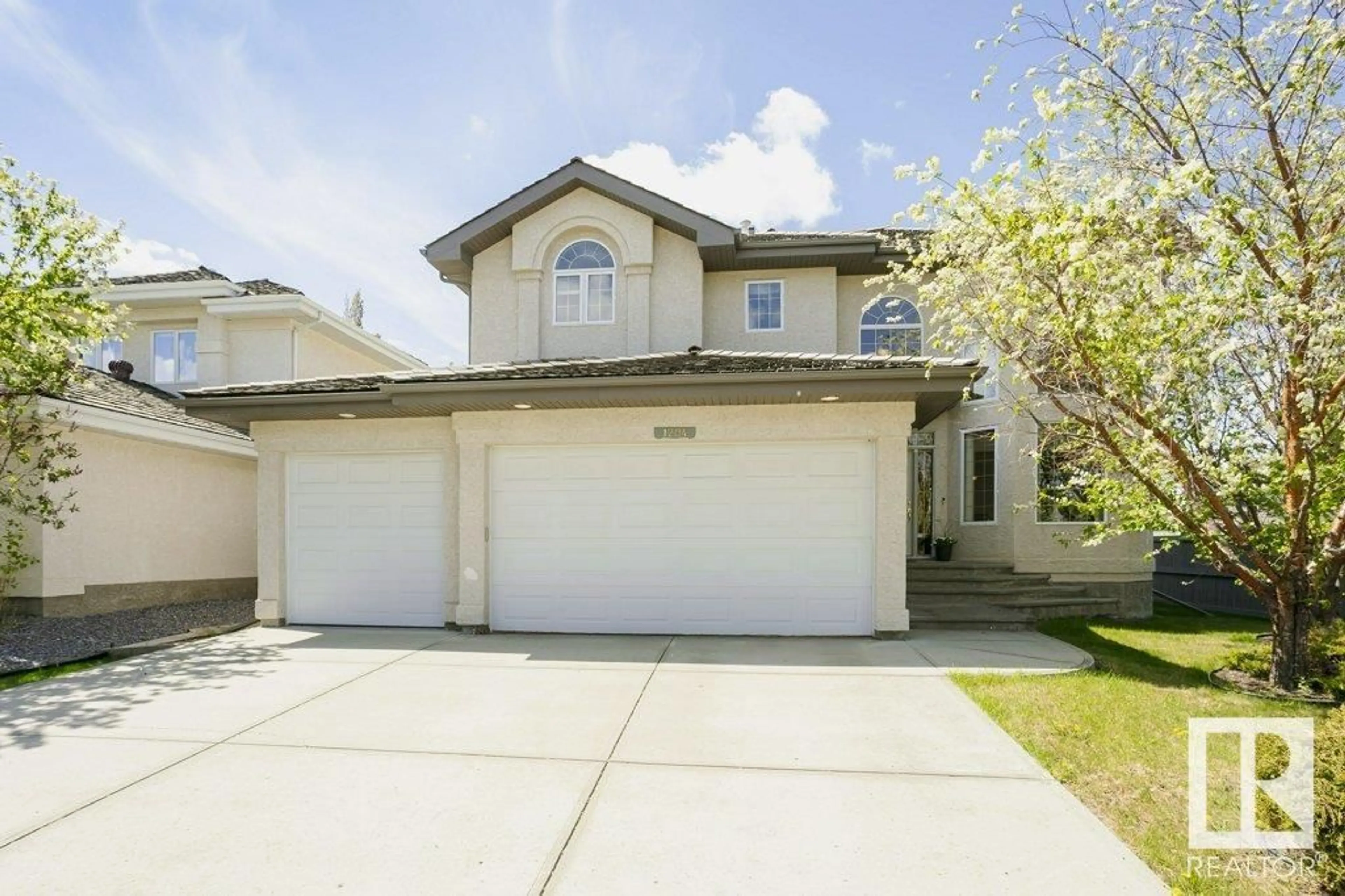 Home with vinyl exterior material, street for 1204 DECKER WY, Edmonton Alberta T6M2V5