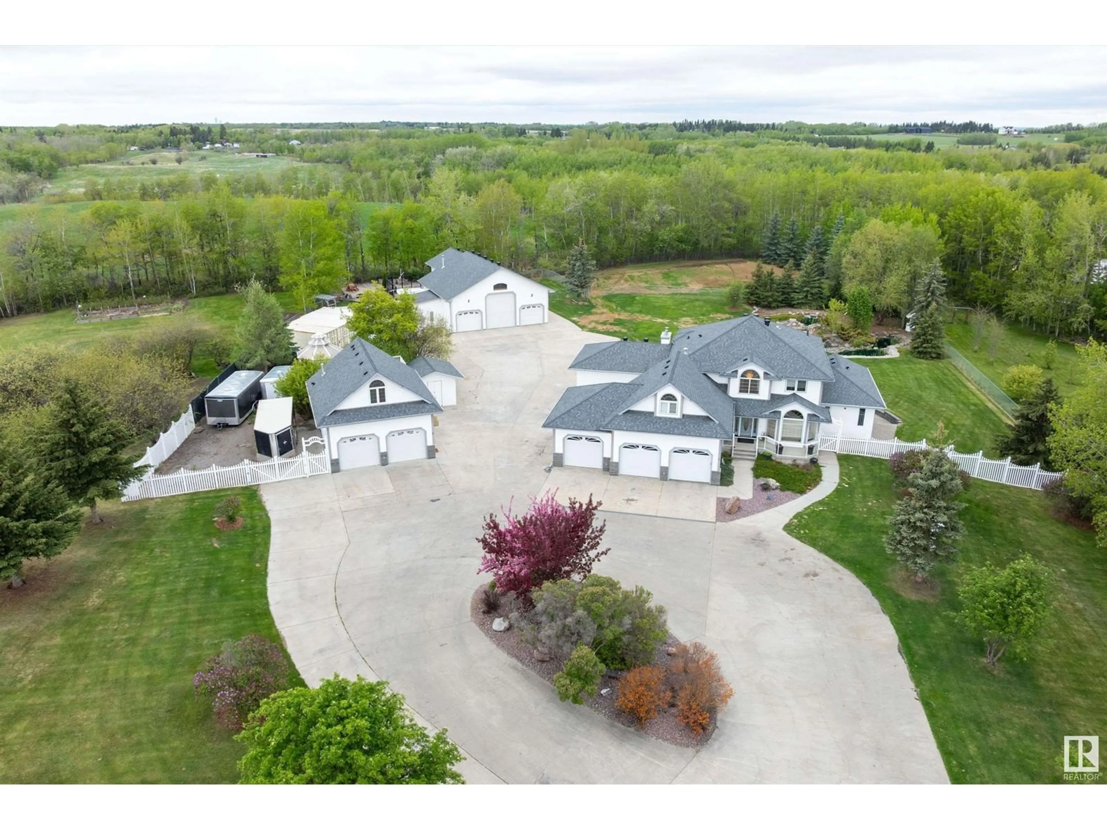 A pic from outside/outdoor area/front of a property/back of a property/a pic from drone, unknown for 52458 - 397 RANGE ROAD 223, Rural Strathcona County Alberta T8A5V1