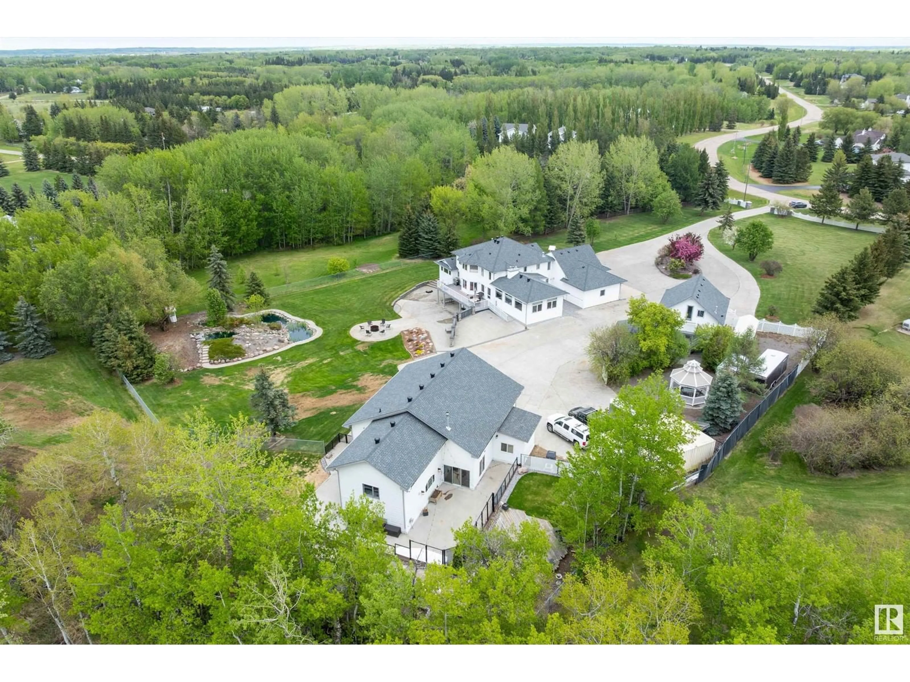 A pic from outside/outdoor area/front of a property/back of a property/a pic from drone, mountain view for 52458 - 397 RANGE ROAD 223, Rural Strathcona County Alberta T8A5V1