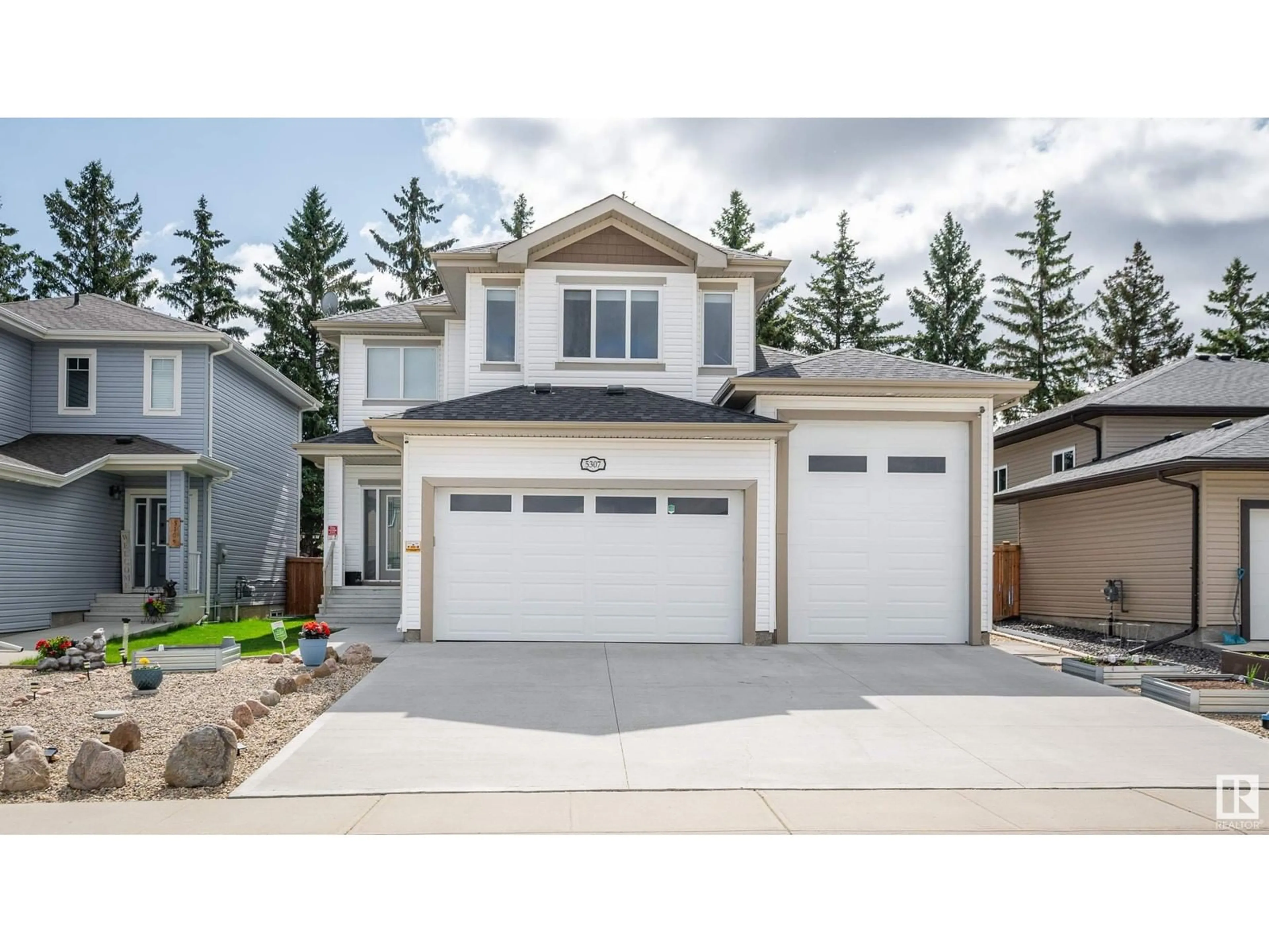 Home with vinyl exterior material, street for 5307 BON ACRES CR, Bon Accord Alberta T0A0K0