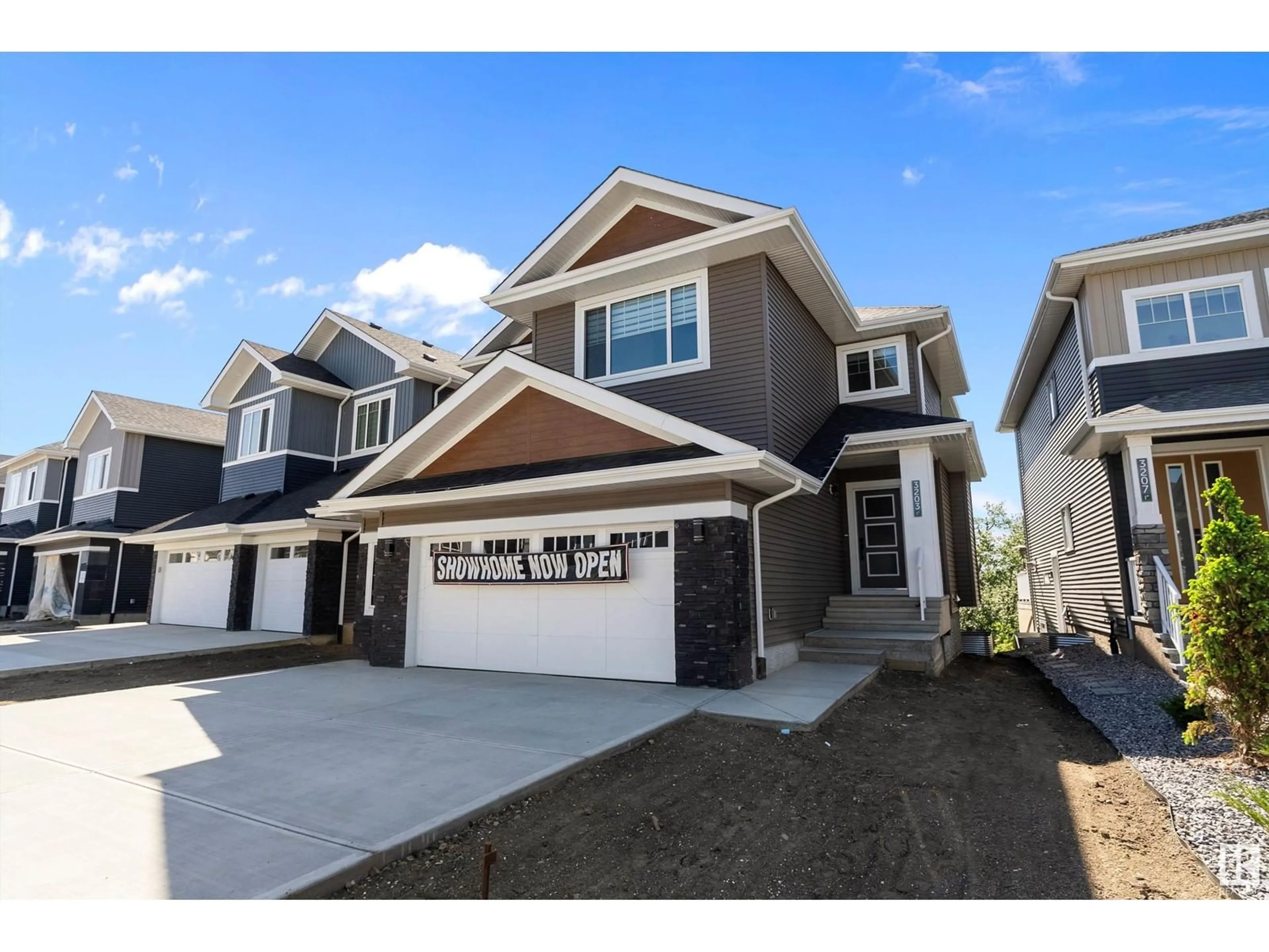 Home with vinyl exterior material, street for SW - 3203 158 ST, Edmonton Alberta T6W5C9