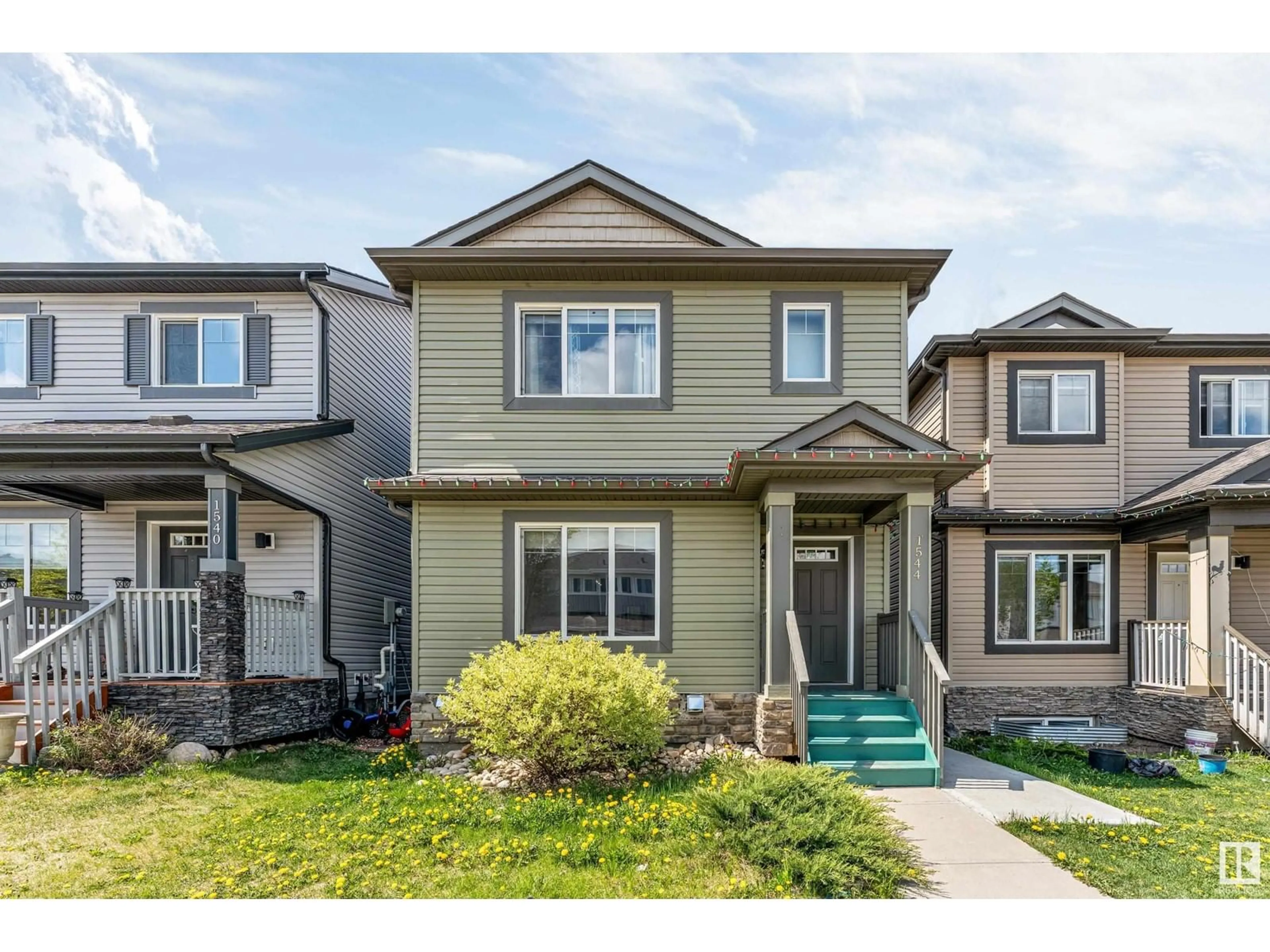 Home with vinyl exterior material, street for NW - 1544 21 ST, Edmonton Alberta T6T2B7