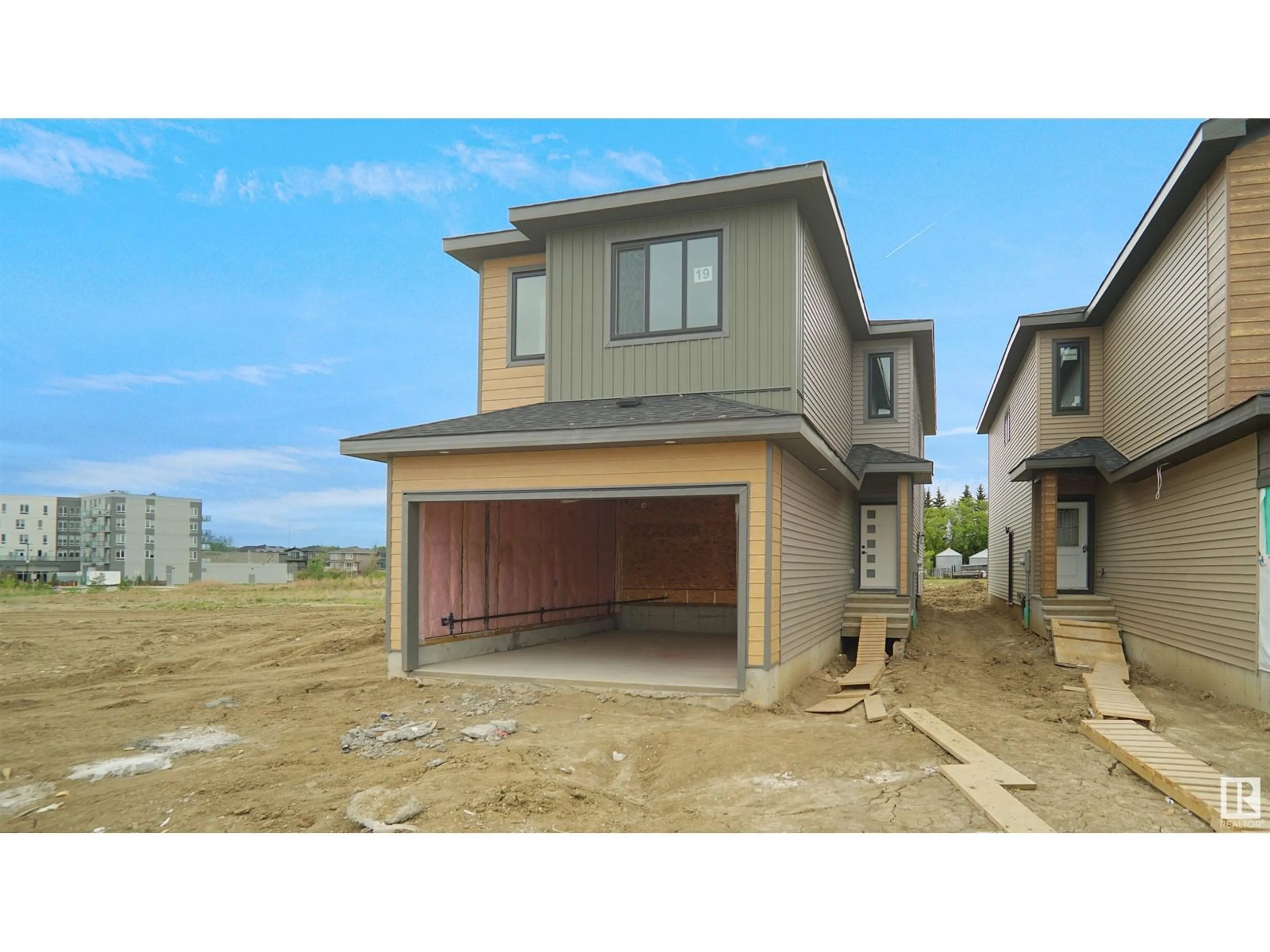 Home with vinyl exterior material, street for 19 TENUTO LINK, Spruce Grove Alberta T6X0Z3