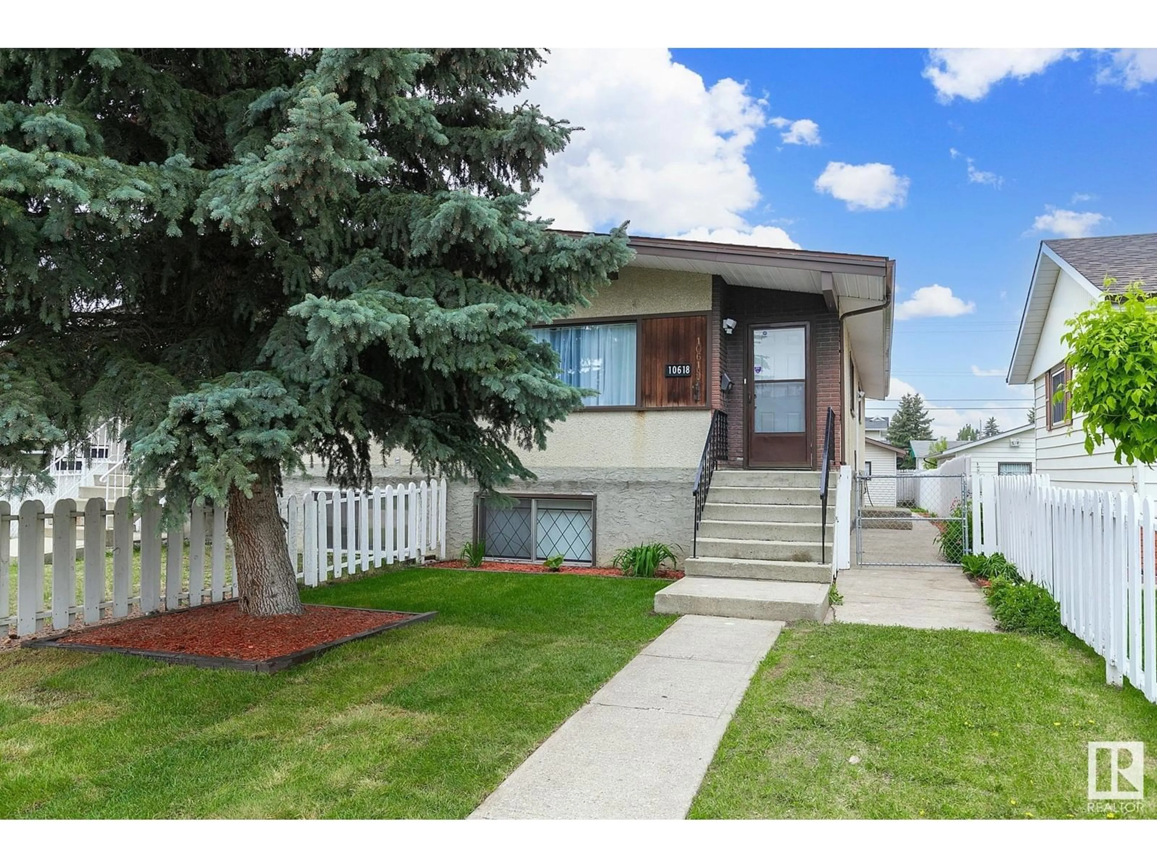 Home with vinyl exterior material, street for NW - 10618 153 ST, Edmonton Alberta T5P2C5