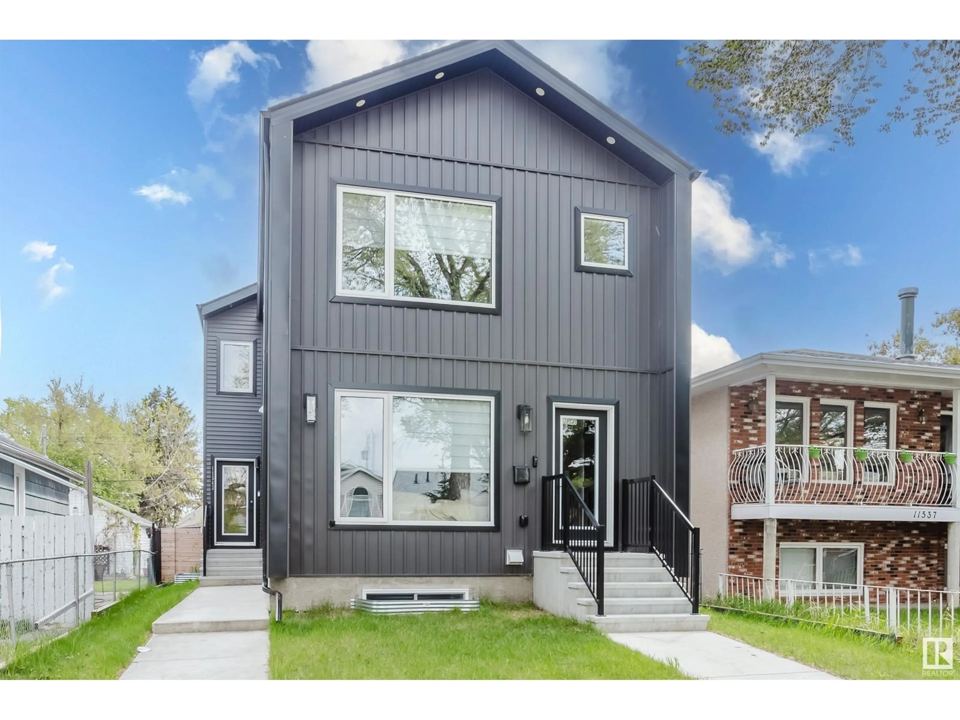 Home with vinyl exterior material, street for NW - 11543 83 ST, Edmonton Alberta T5B2Y6