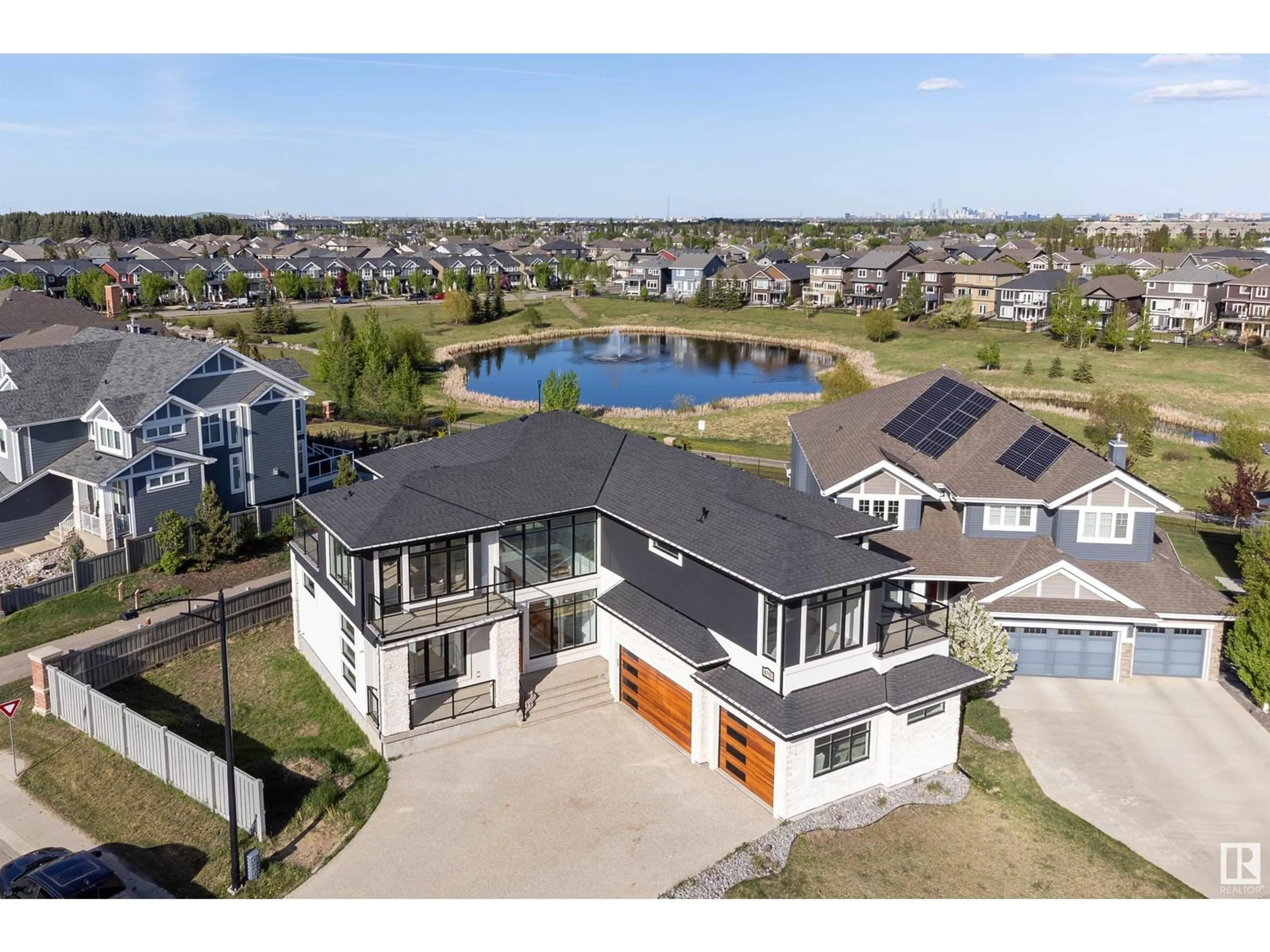 A pic from outside/outdoor area/front of a property/back of a property/a pic from drone, water/lake/river/ocean view for 8715 219 ST NW, Edmonton Alberta T5T7E3