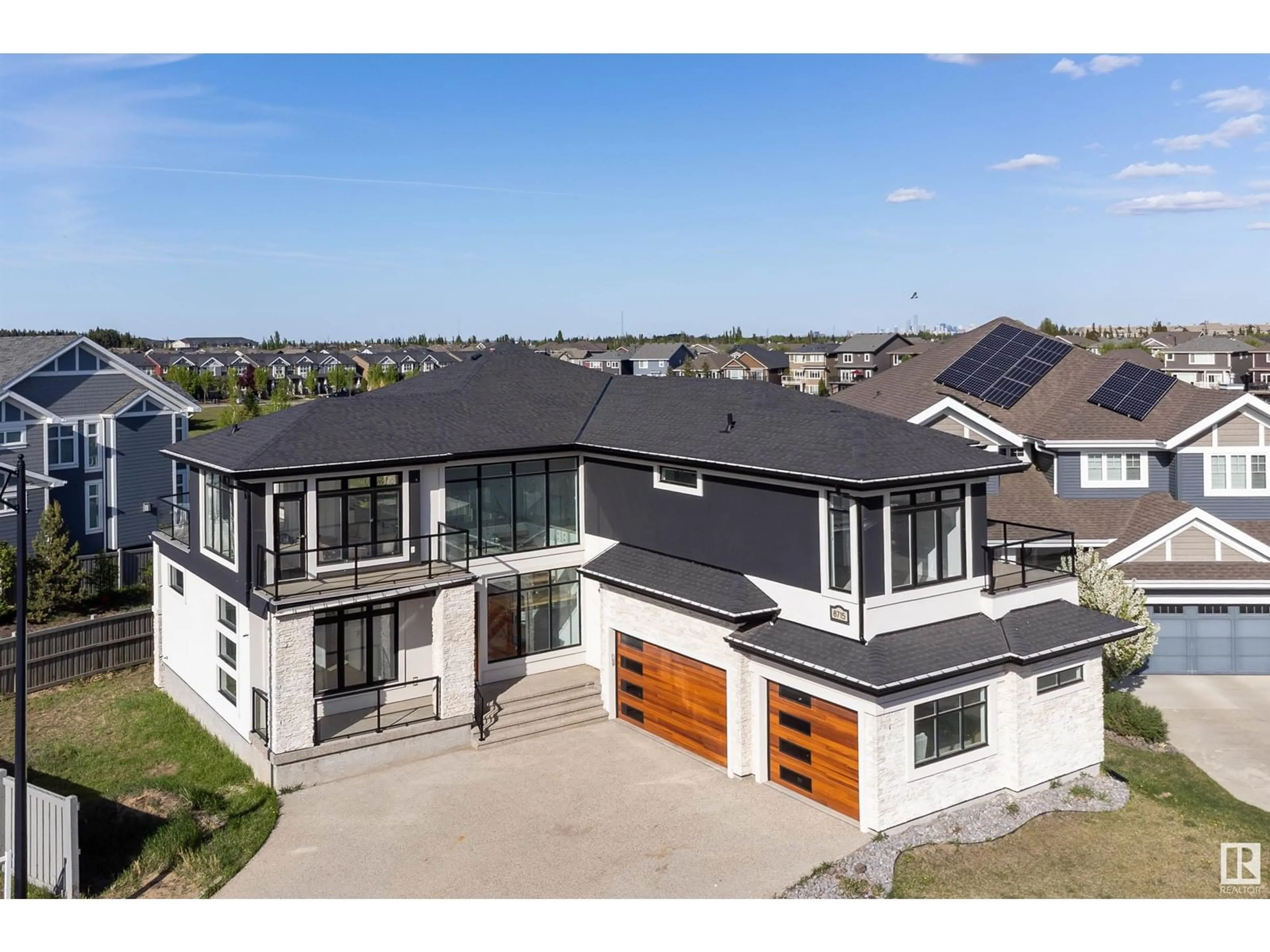 A pic from outside/outdoor area/front of a property/back of a property/a pic from drone, street for 8715 219 ST NW, Edmonton Alberta T5T7E3