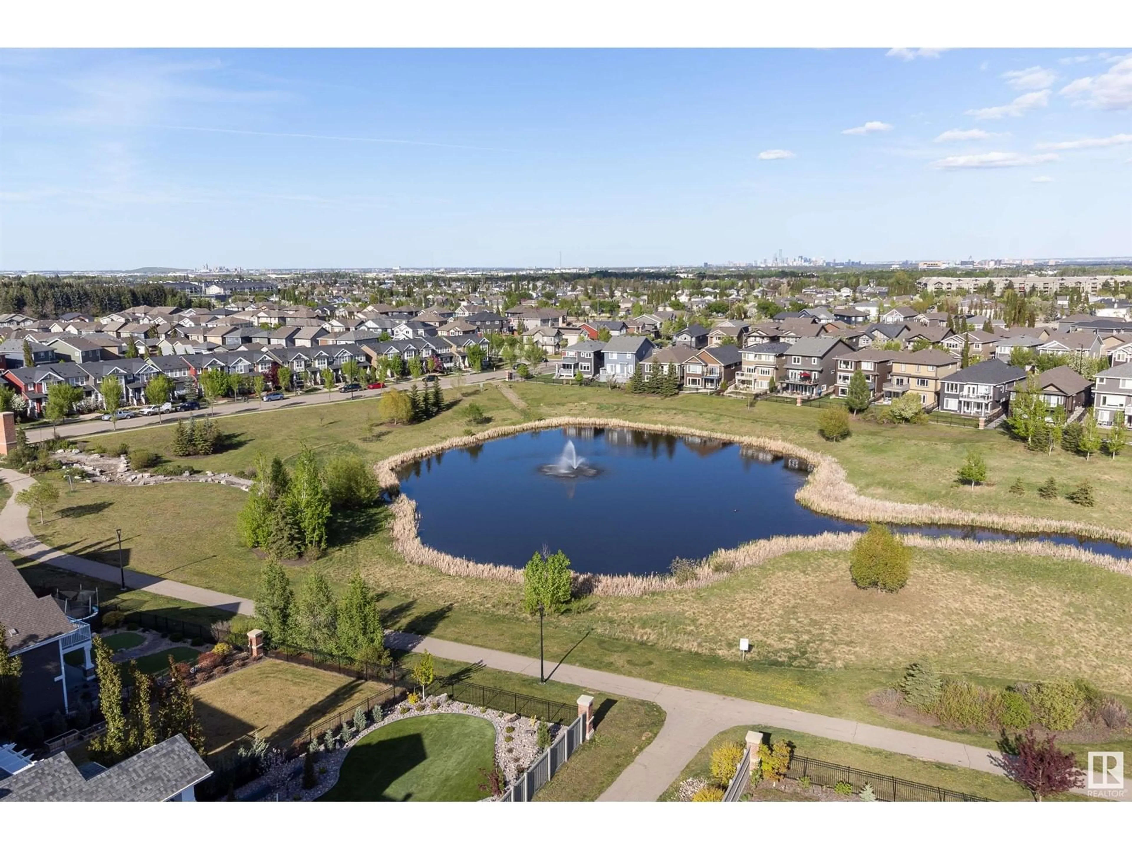 A pic from outside/outdoor area/front of a property/back of a property/a pic from drone, water/lake/river/ocean view for 8715 219 ST NW, Edmonton Alberta T5T7E3