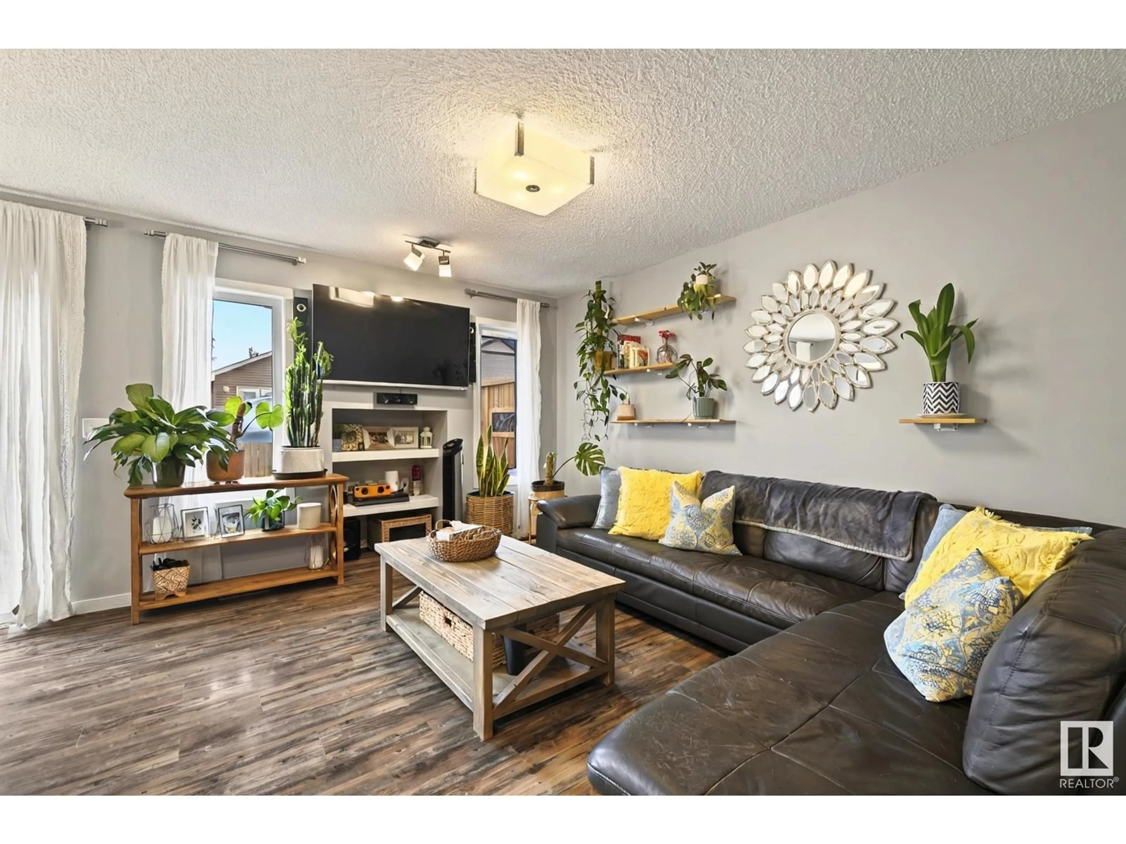 Living room with furniture, wood/laminate floor for 17417 120 ST, Edmonton Alberta T5X0K6