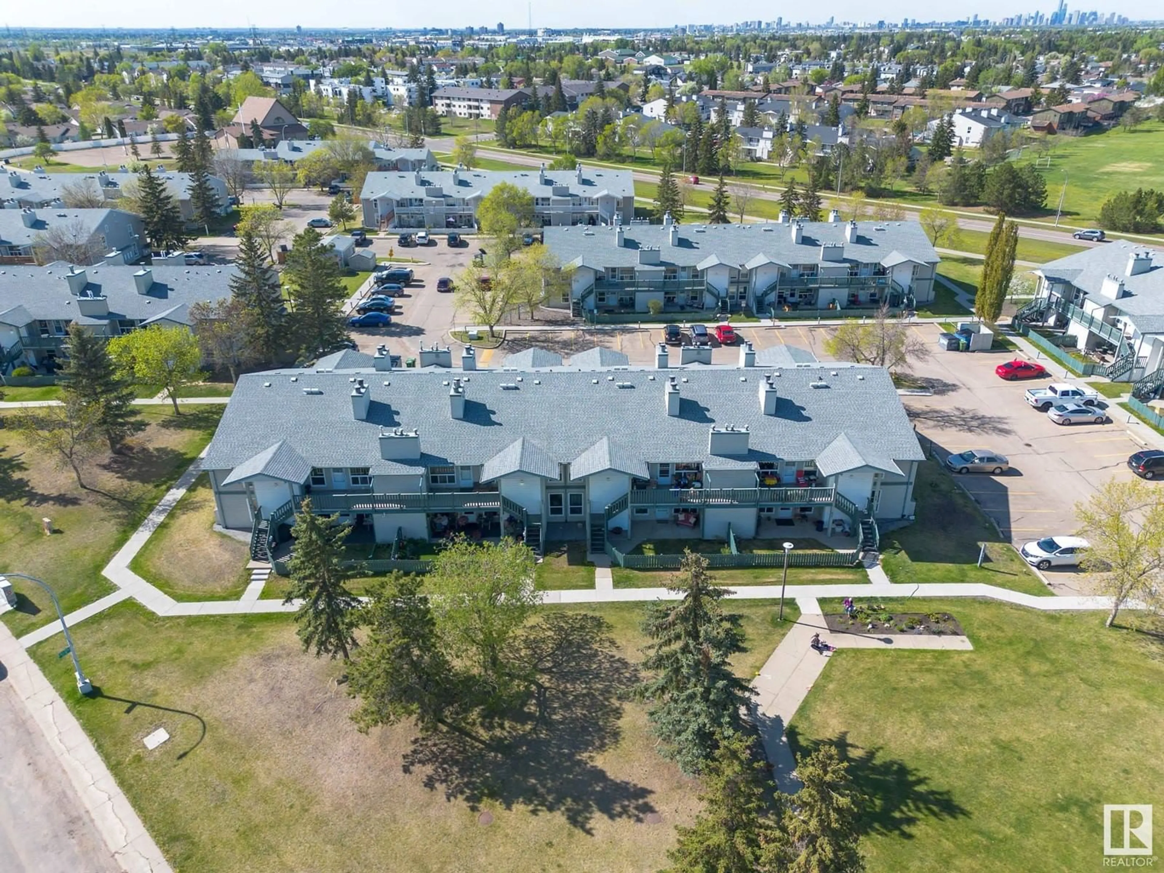 A pic from outside/outdoor area/front of a property/back of a property/a pic from drone, unknown for 64 2703 79 ST NW, Edmonton Alberta T6K3Z6