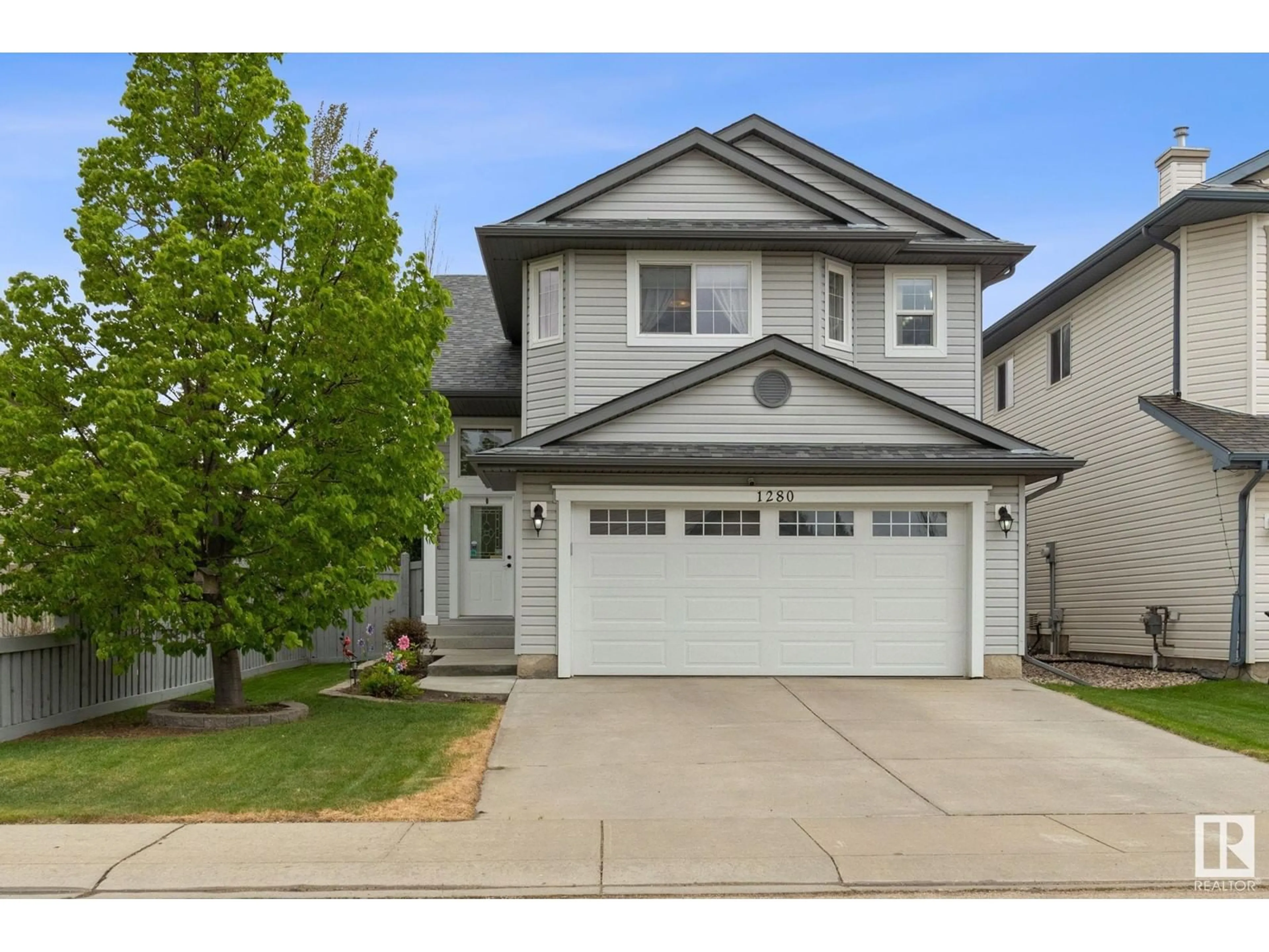 Home with vinyl exterior material, street for 1280 MCALLISTER WY, Edmonton Alberta T6W0B1