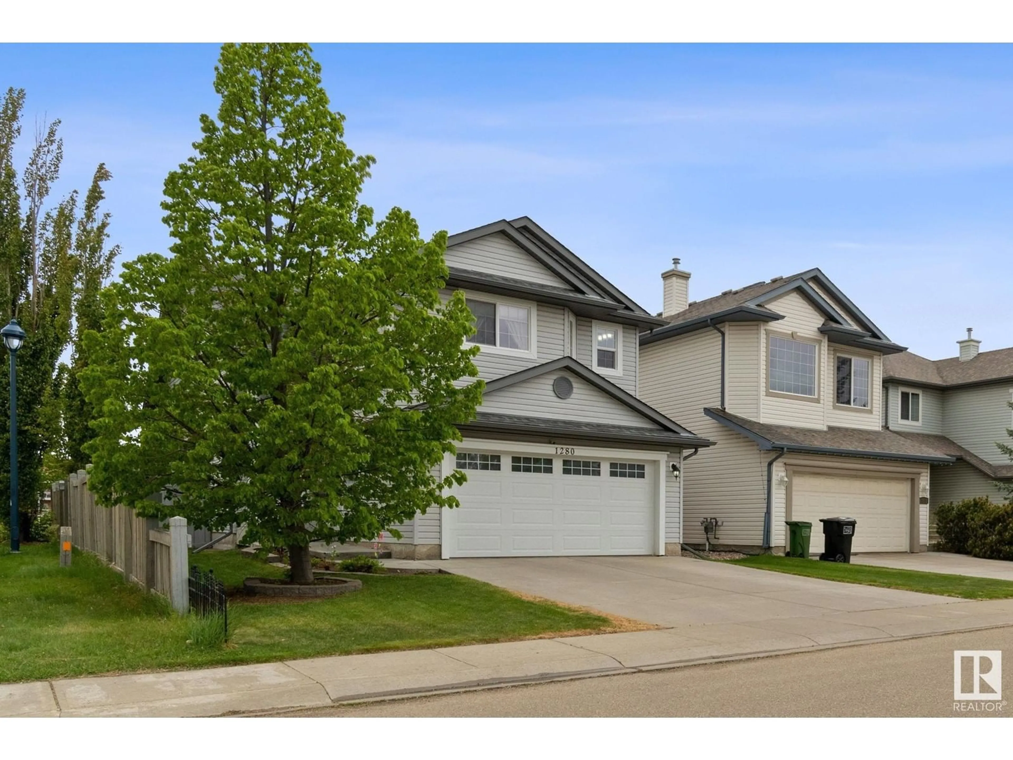 Home with vinyl exterior material, street for 1280 MCALLISTER WY, Edmonton Alberta T6W0B1