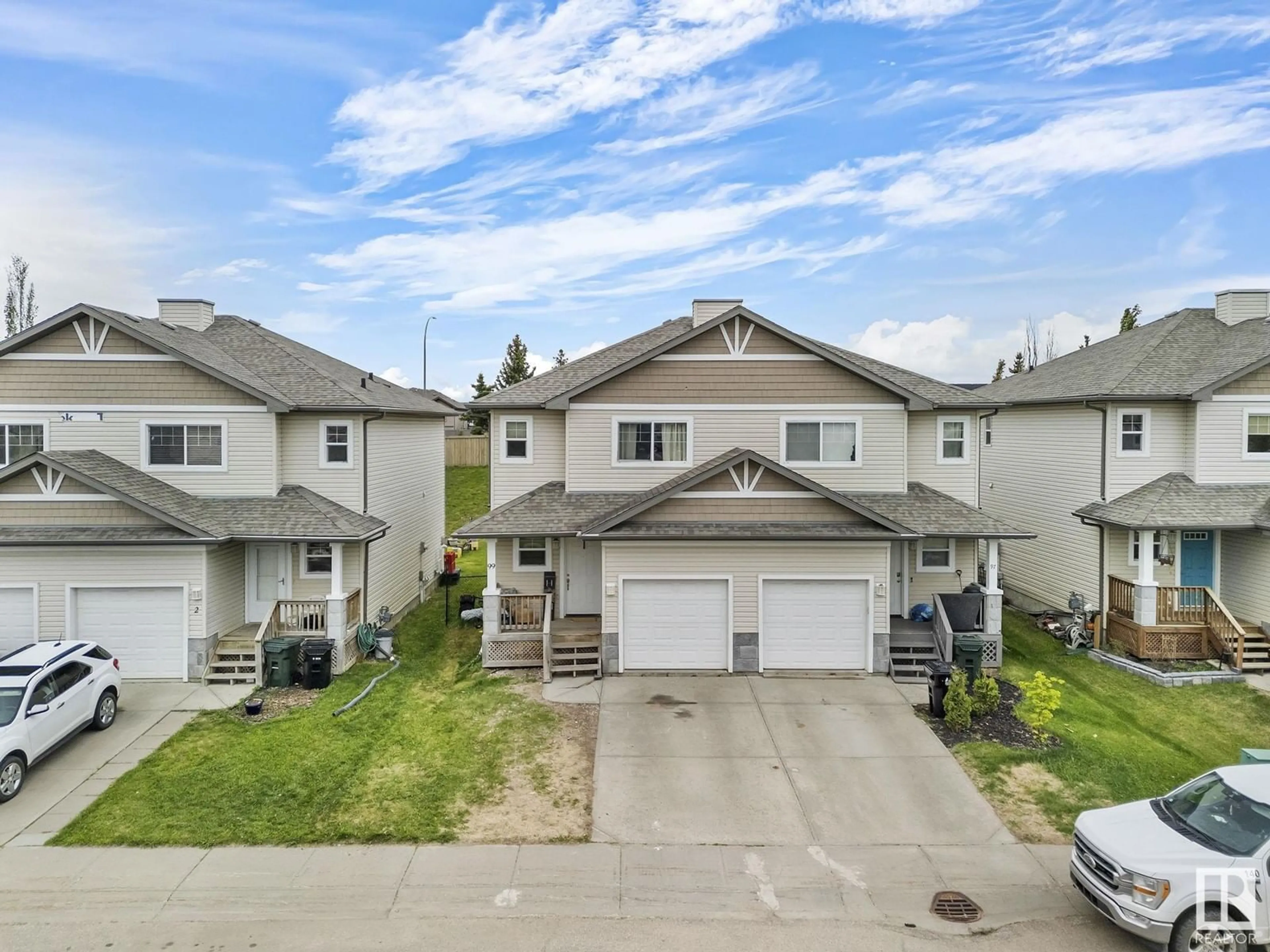 A pic from outside/outdoor area/front of a property/back of a property/a pic from drone, street for 99 HARTWICK LO, Spruce Grove Alberta T7X0A5