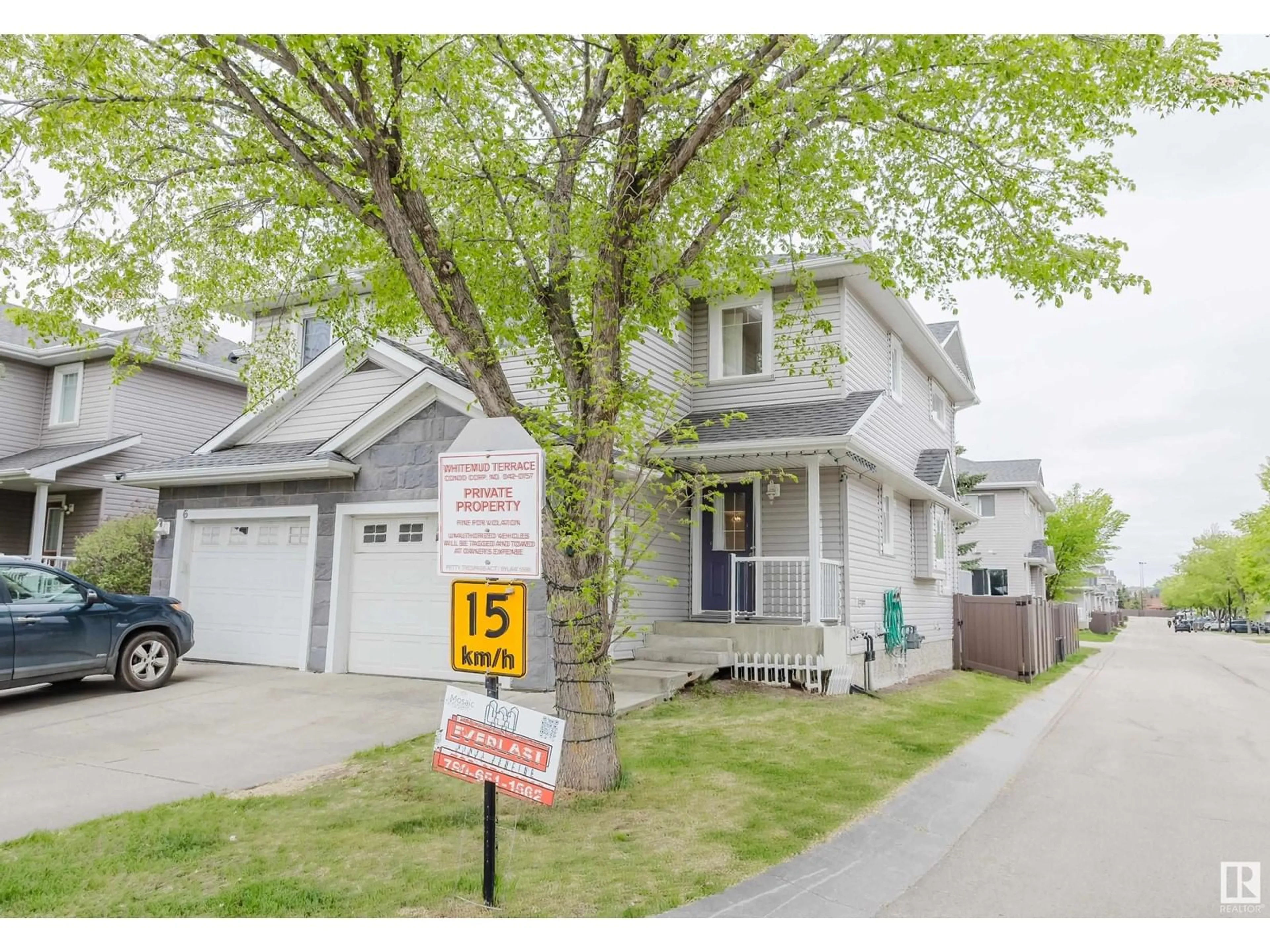 Home with vinyl exterior material, street for #7 - 1428 HODGSON WY, Edmonton Alberta T6R3P8