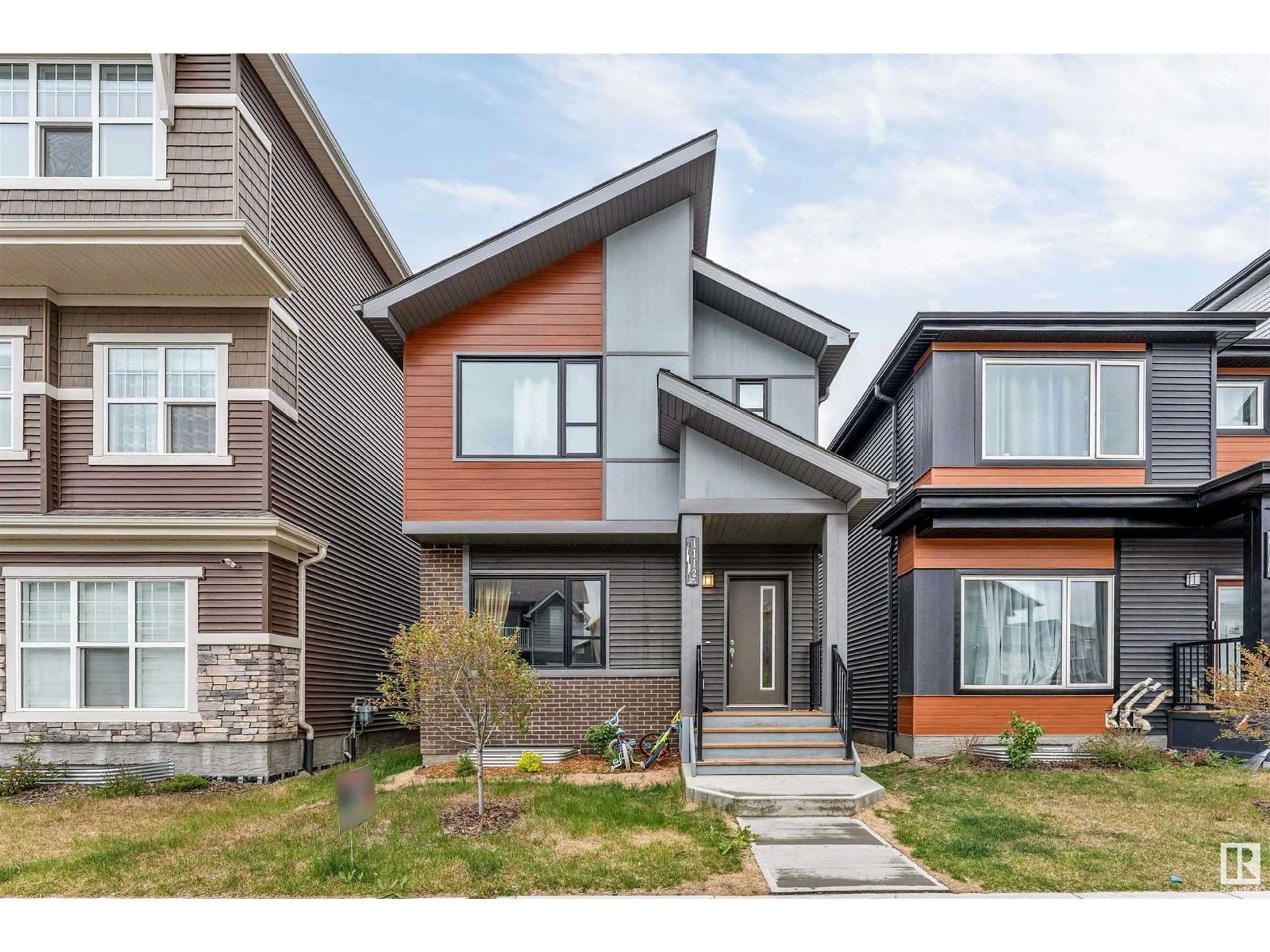 Home with vinyl exterior material, street for SW SW - 1112 PLUM LN, Edmonton Alberta T6X3A7