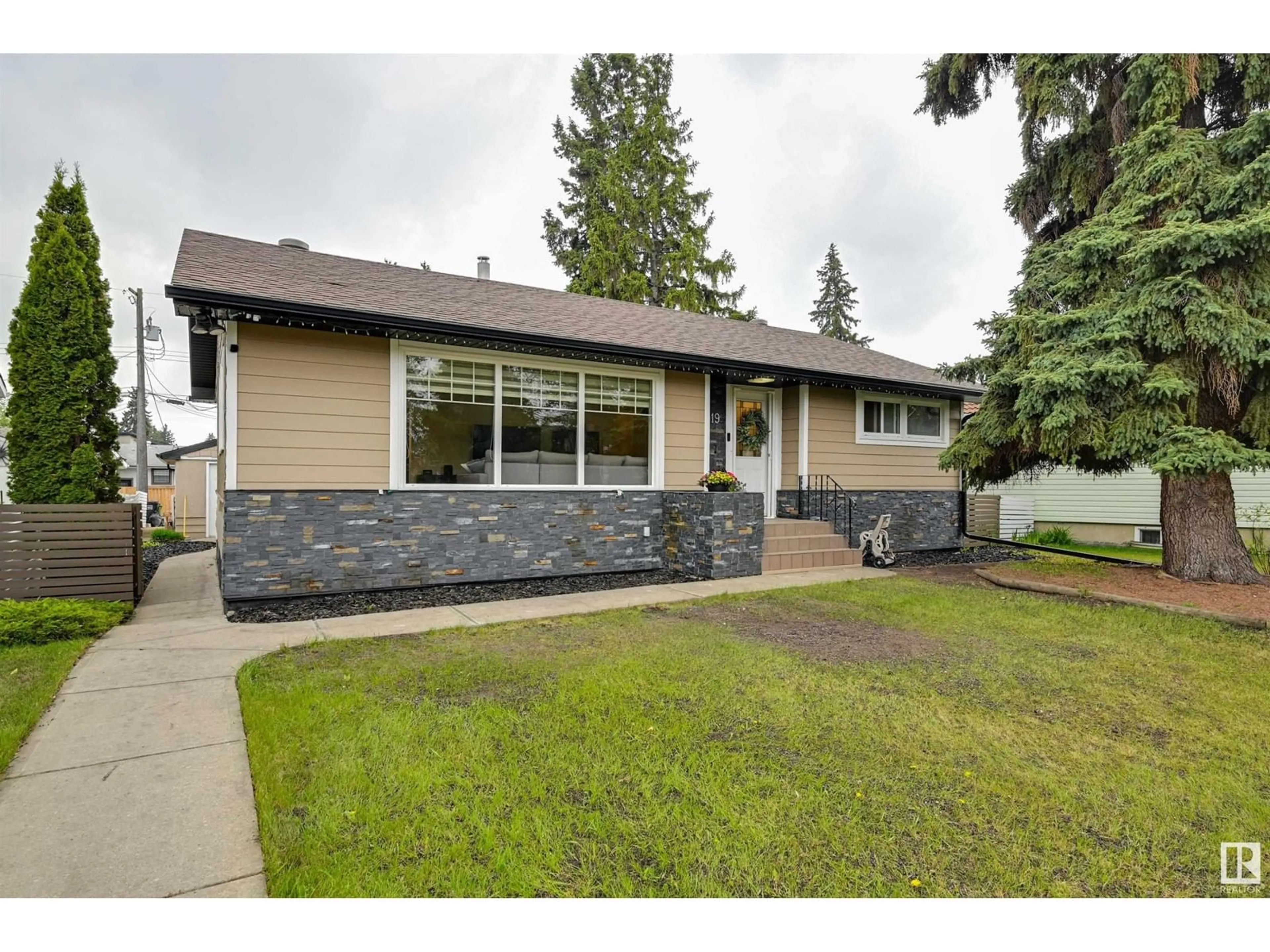 Home with vinyl exterior material, street for 14419 96 AV, Edmonton Alberta T5N0C6