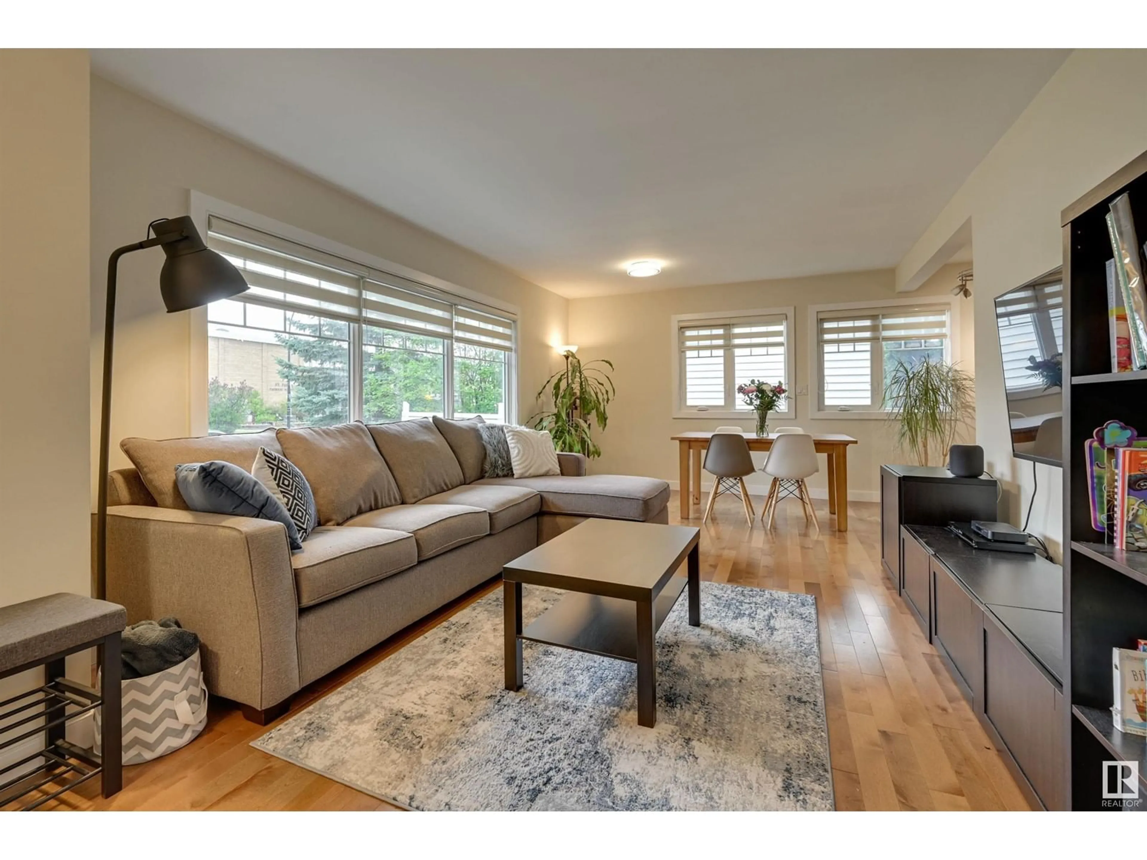 Living room with furniture, wood/laminate floor for 14419 96 AV, Edmonton Alberta T5N0C6