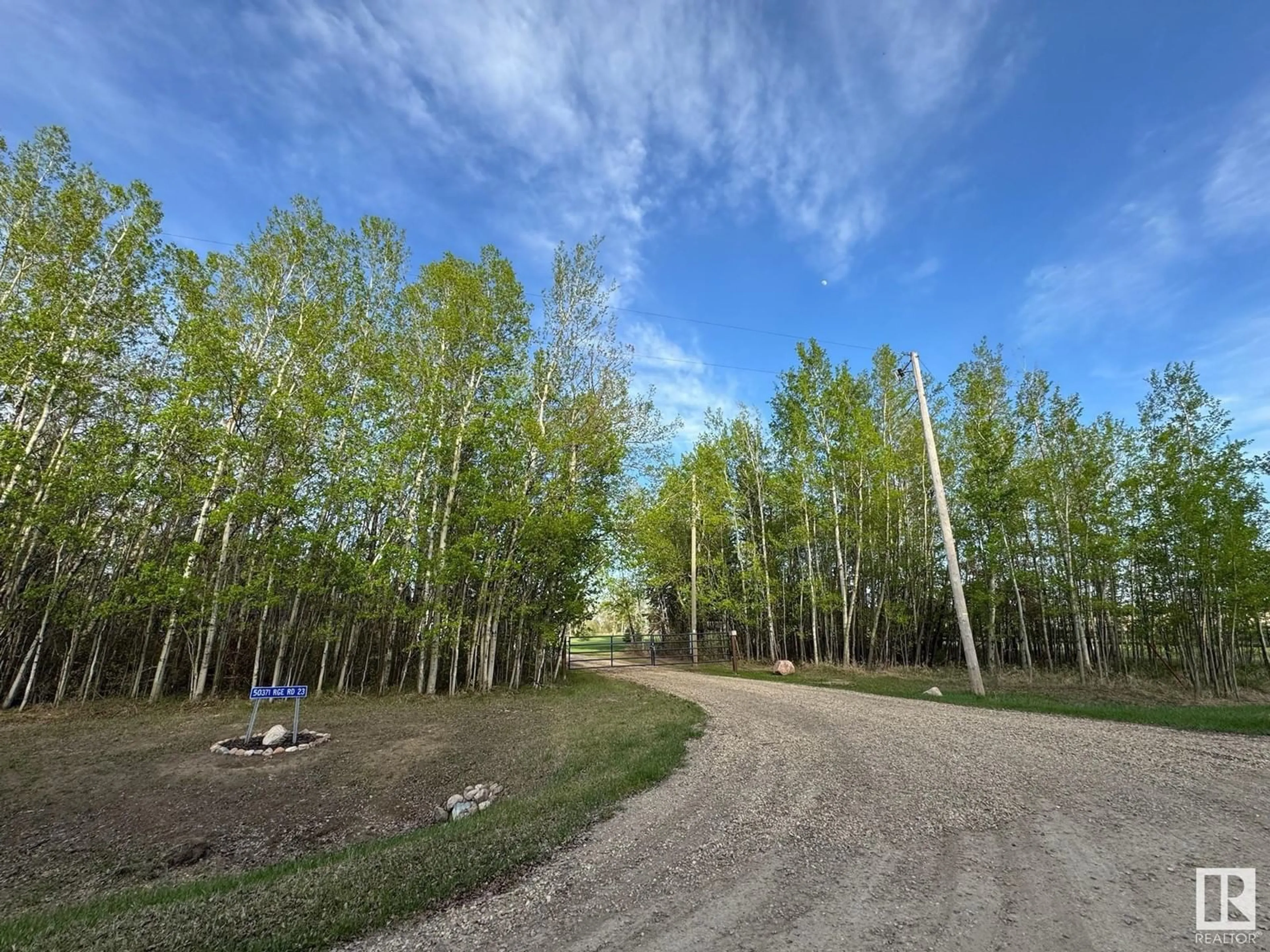 A pic from outside/outdoor area/front of a property/back of a property/a pic from drone, forest/trees view for 50371 RGE ROAD 23, Rural Leduc County Alberta T0C2P0