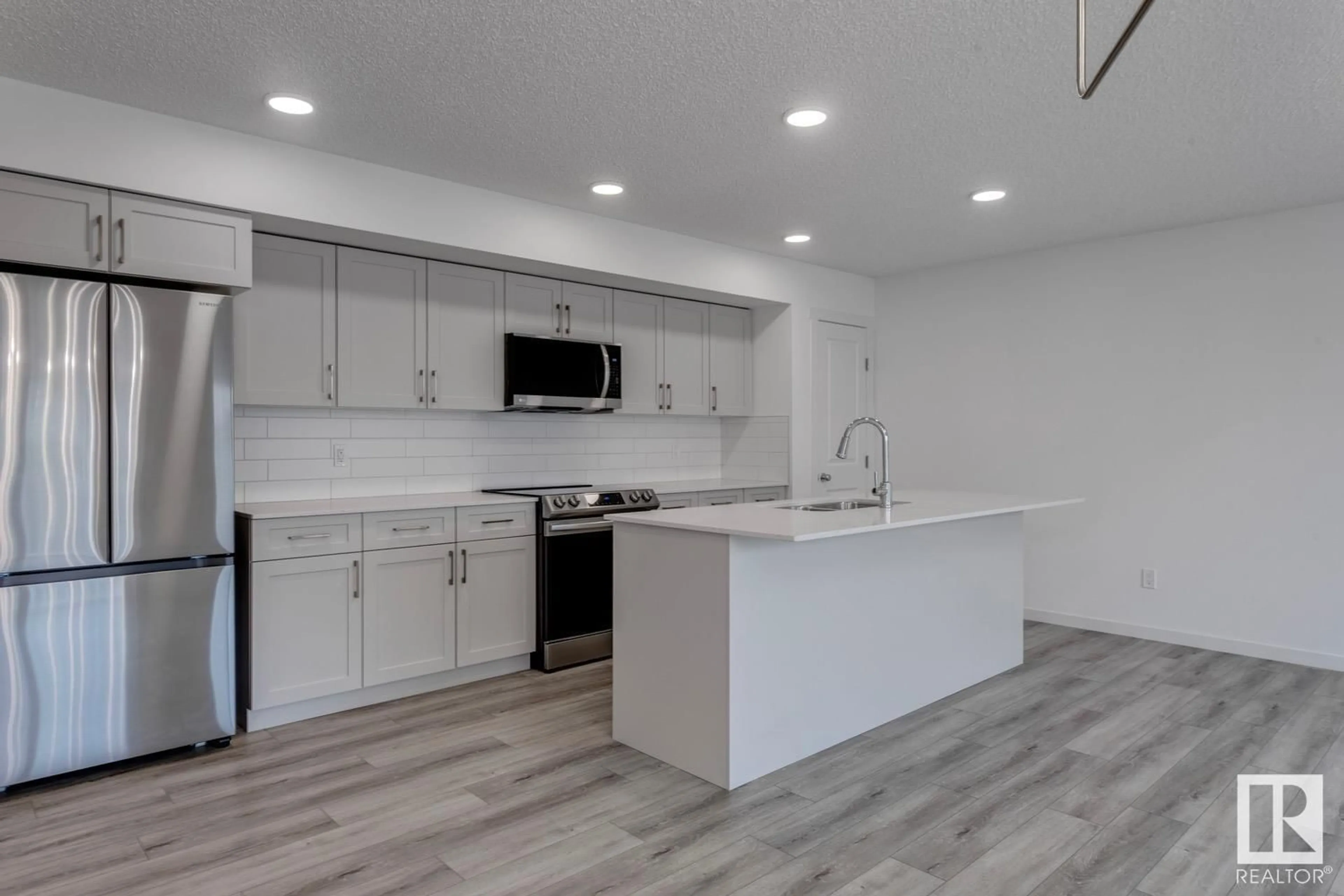 Open concept kitchen, unknown for #33 - 905 172 ST, Edmonton Alberta T6W5L8