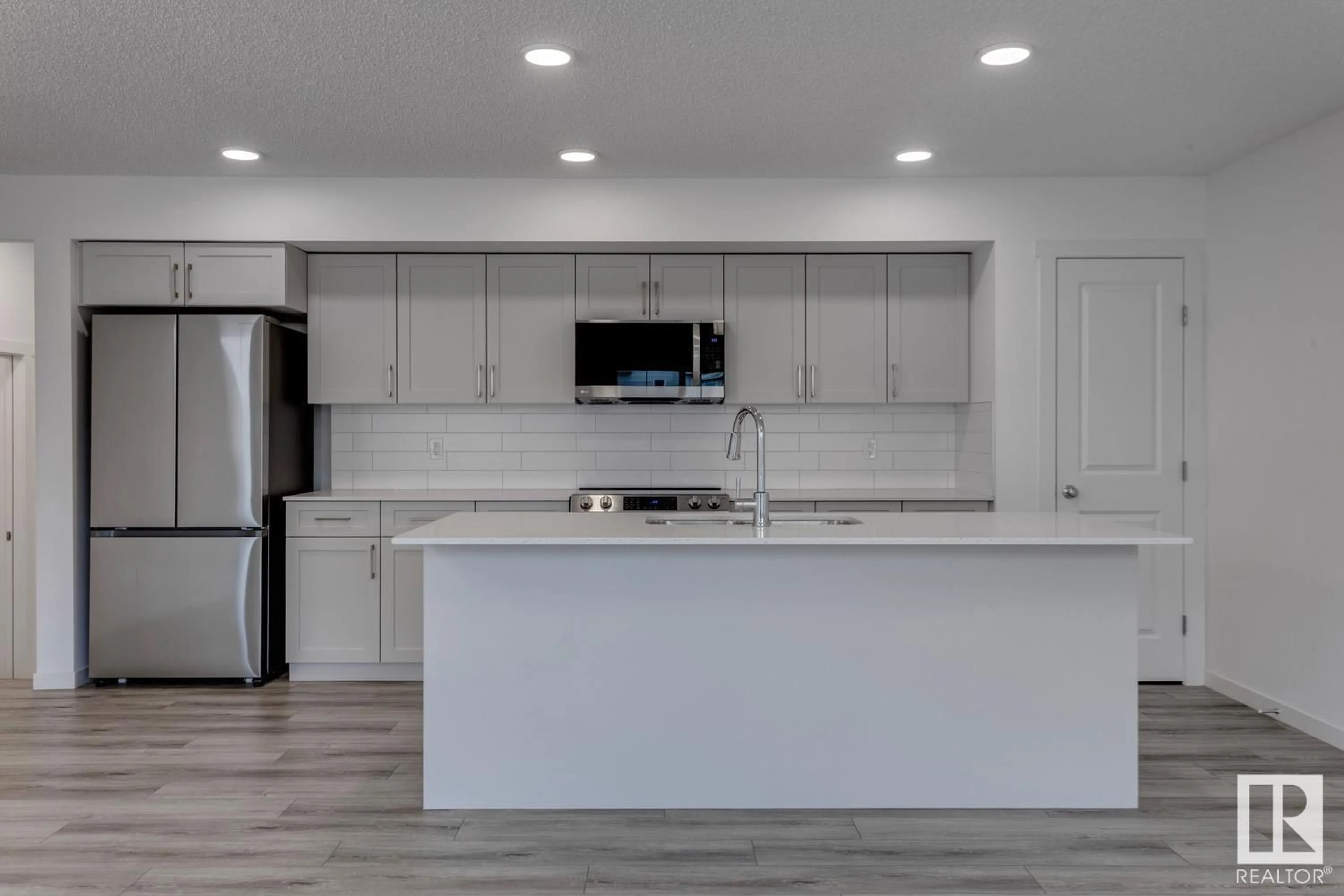 Open concept kitchen, ceramic/tile floor for #33 - 905 172 ST, Edmonton Alberta T6W5L8