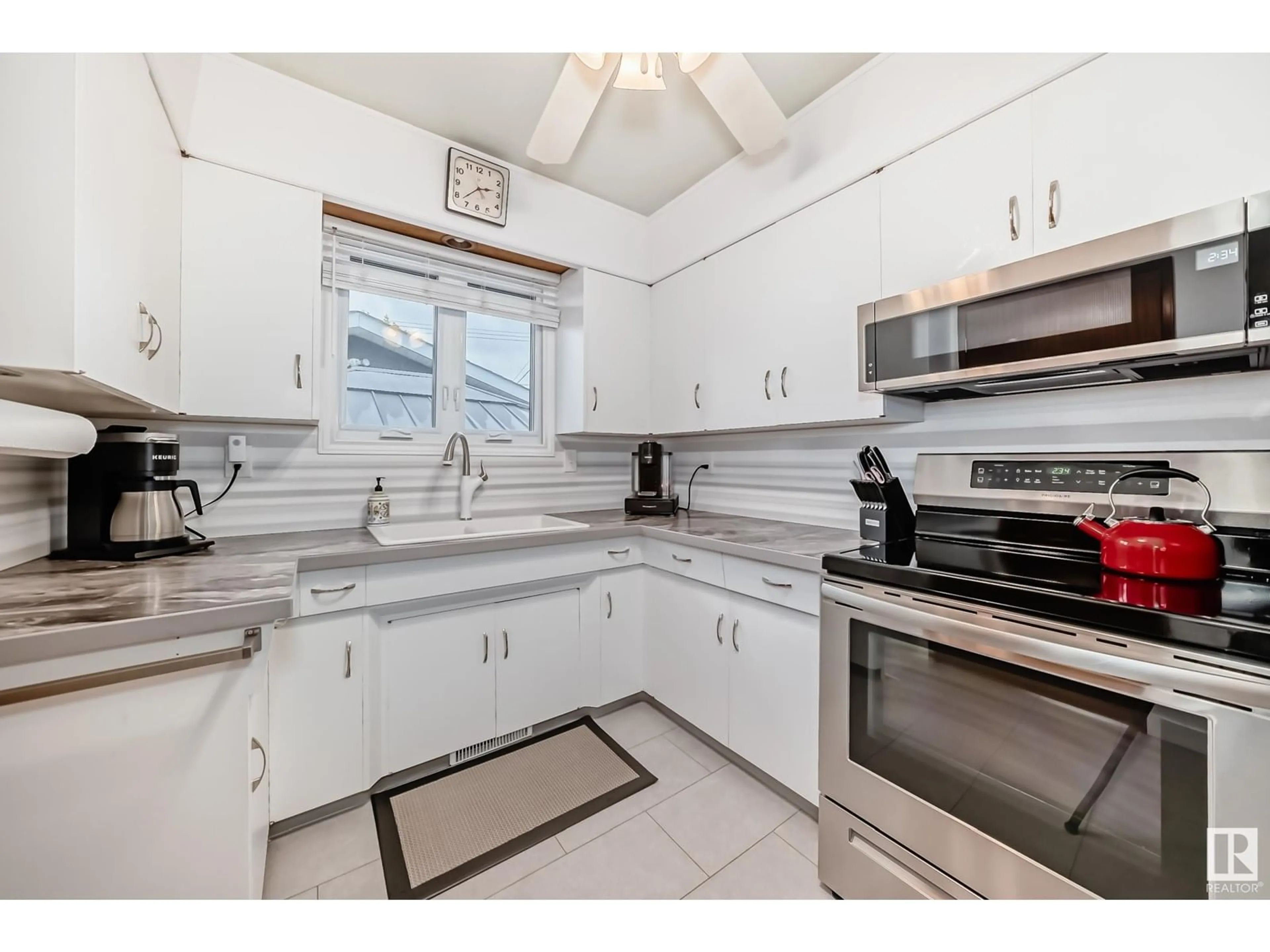 Standard kitchen, ceramic/tile floor for 7012 132 AV, Edmonton Alberta T5C2A6