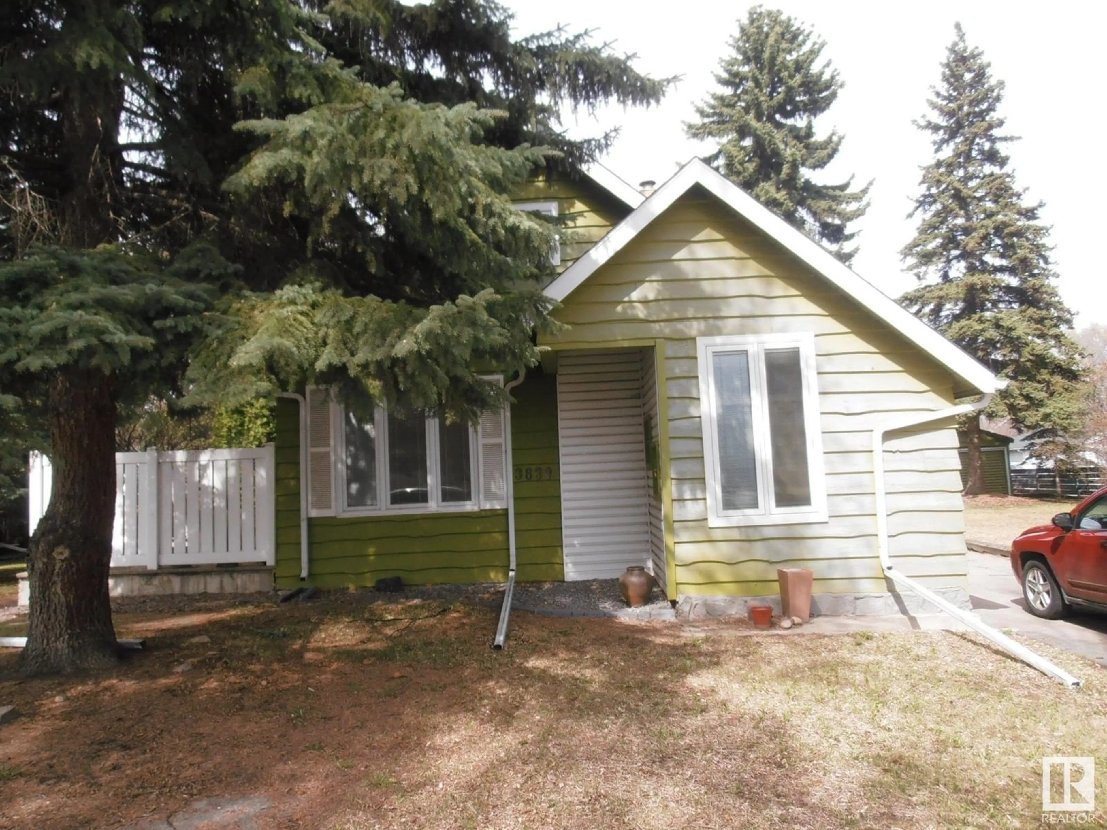 Home with vinyl exterior material, street for 3830 112 AV, Edmonton Alberta T5W0M6