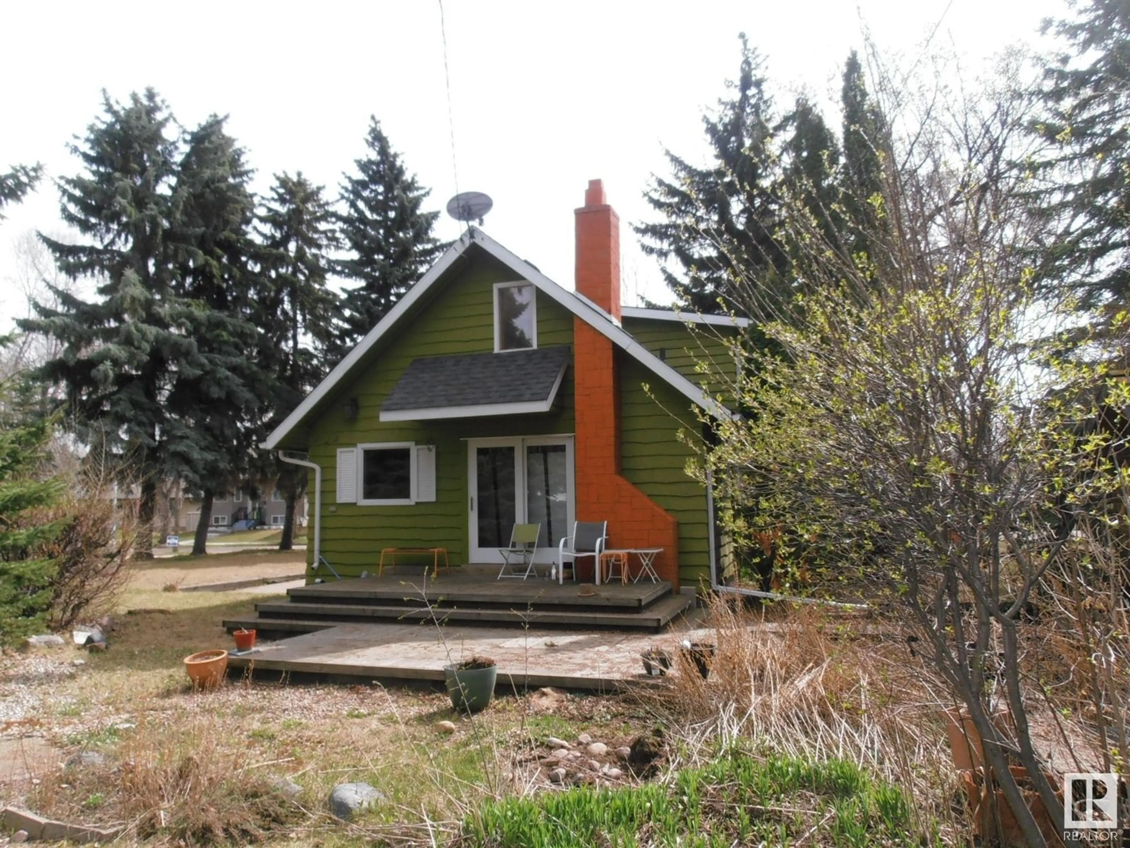 Home with vinyl exterior material, street for 3830 112 AV, Edmonton Alberta T5W0M6