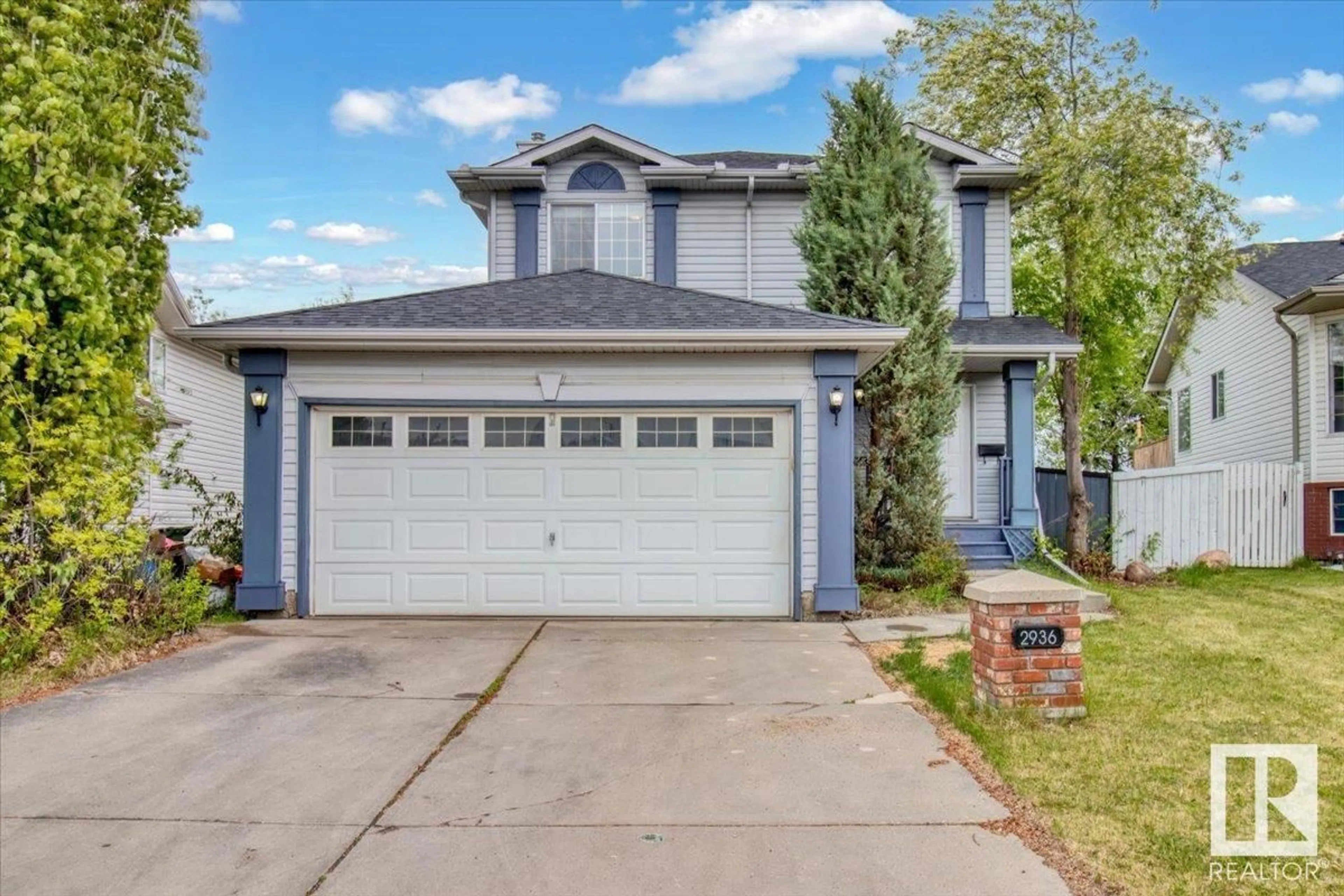 Home with vinyl exterior material, street for 2936 41 AV, Edmonton Alberta T6T1K5