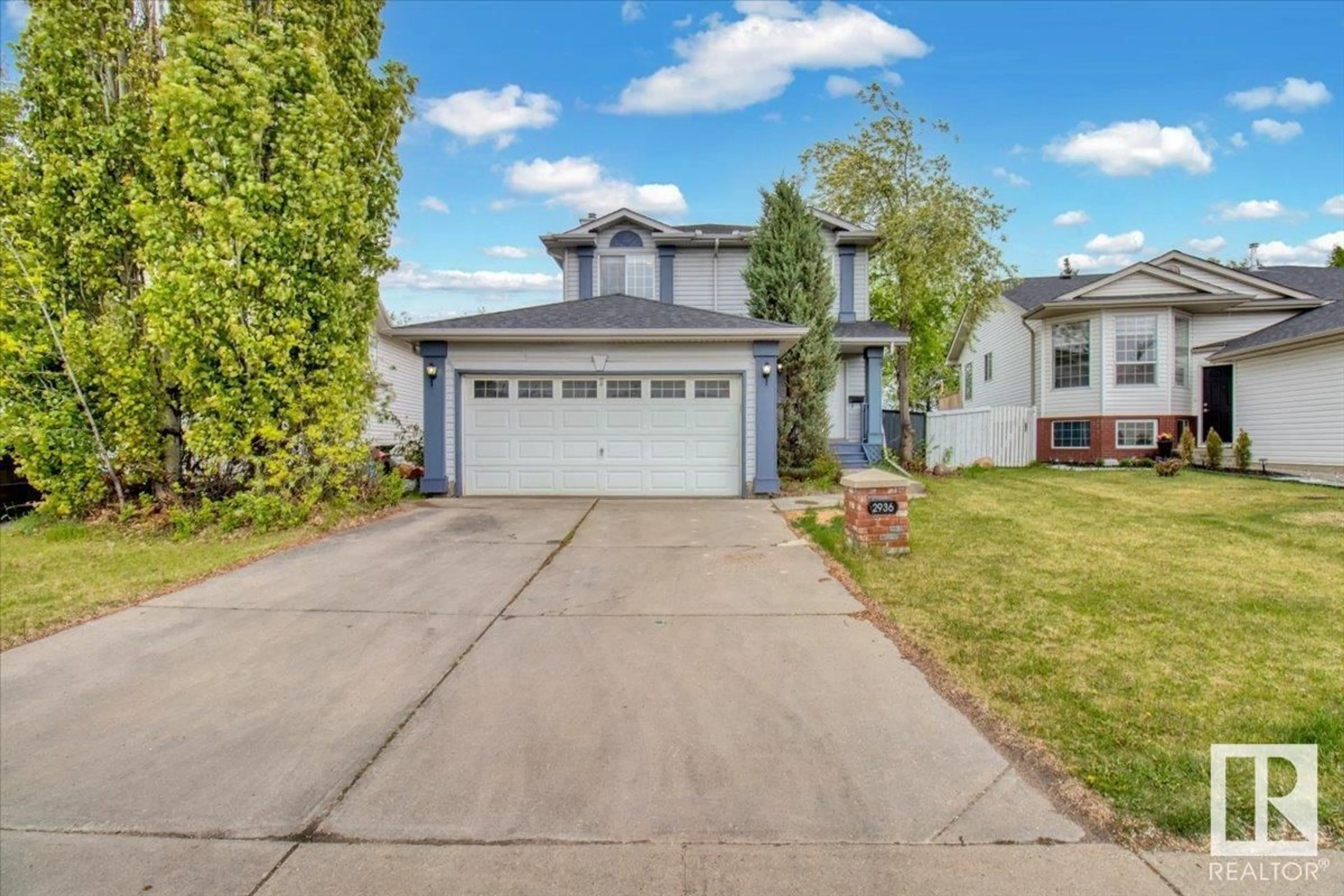 Home with vinyl exterior material, street for 2936 41 AV, Edmonton Alberta T6T1K5