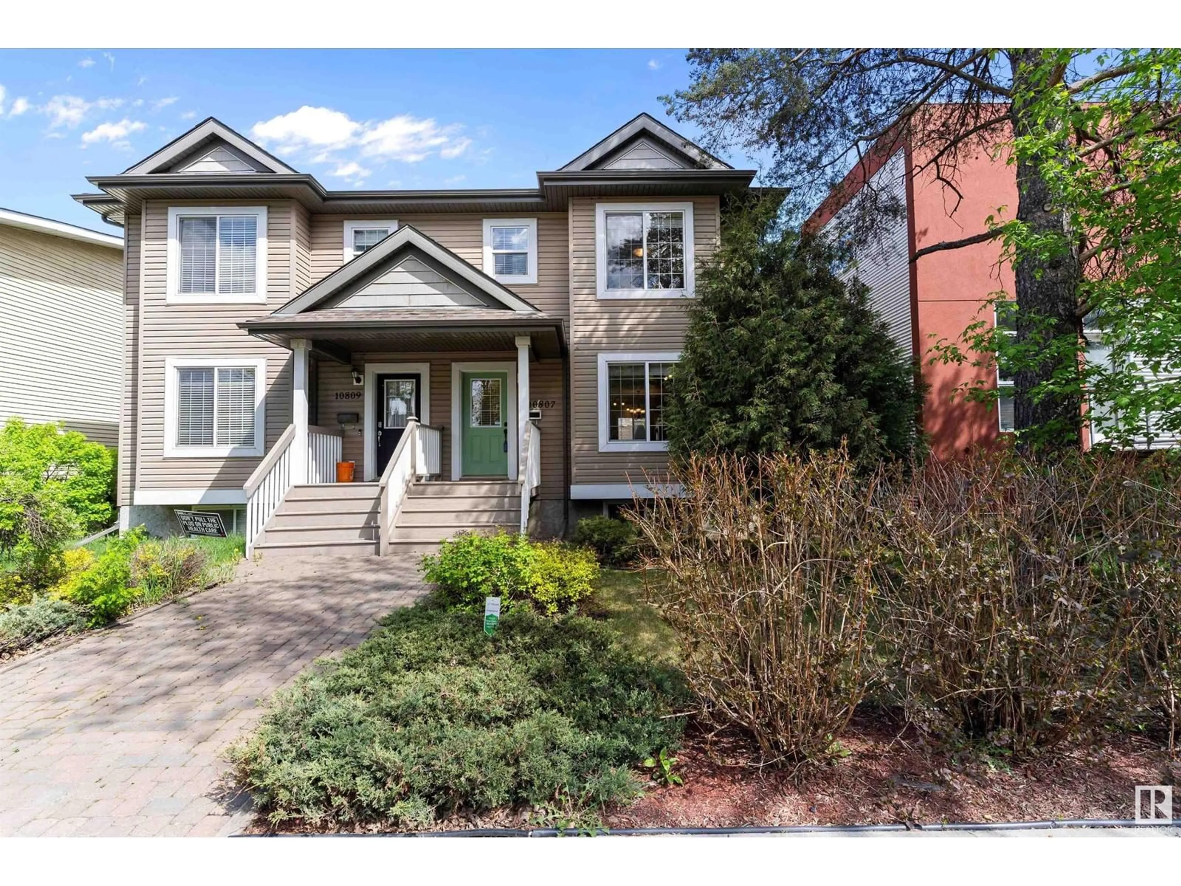 Home with brick exterior material, street for 10807 127 ST, Edmonton Alberta T5M0S6