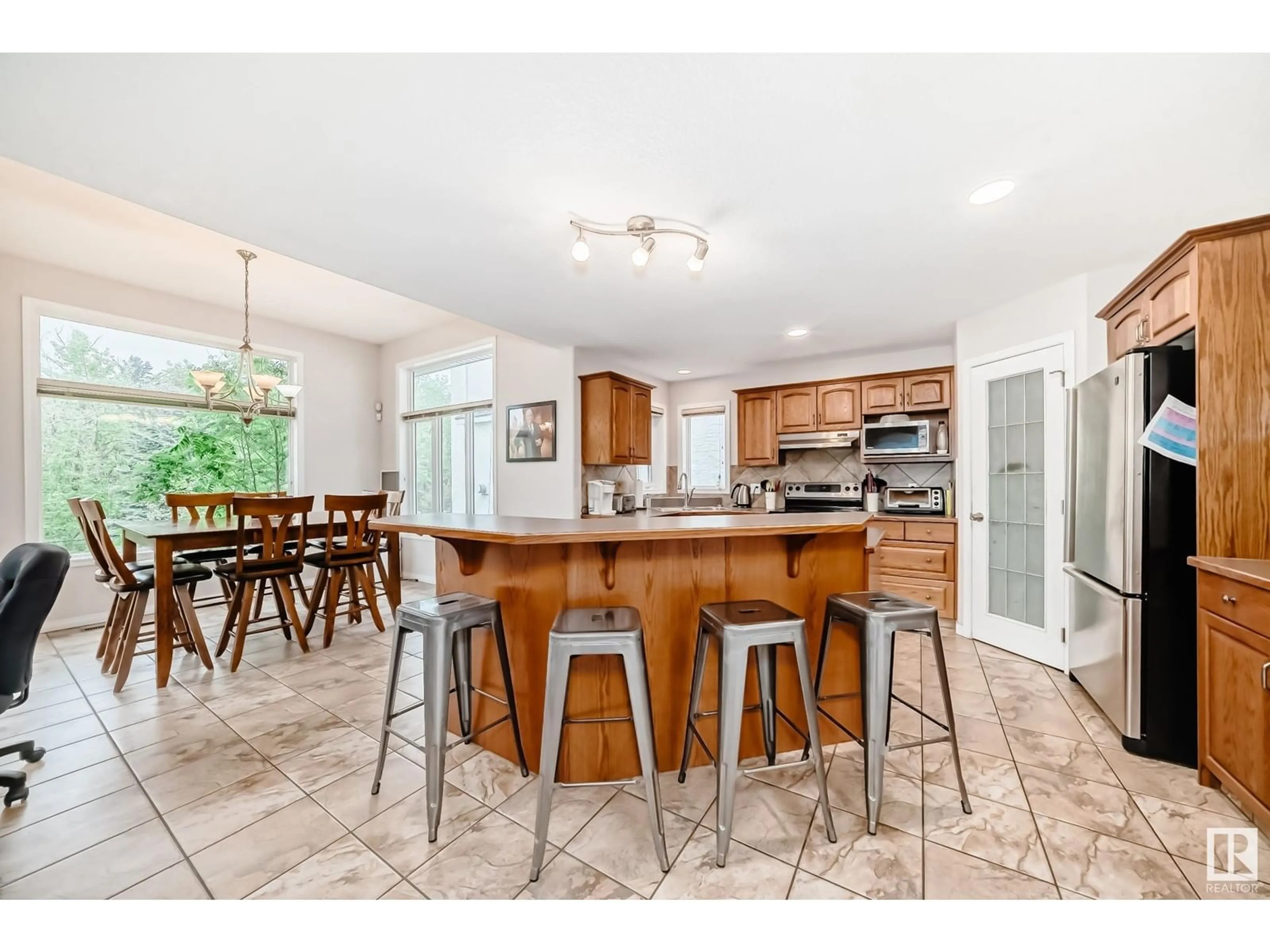 Open concept kitchen, ceramic/tile floor for 657 SILVER BERRY RD, Edmonton Alberta T6T1X7