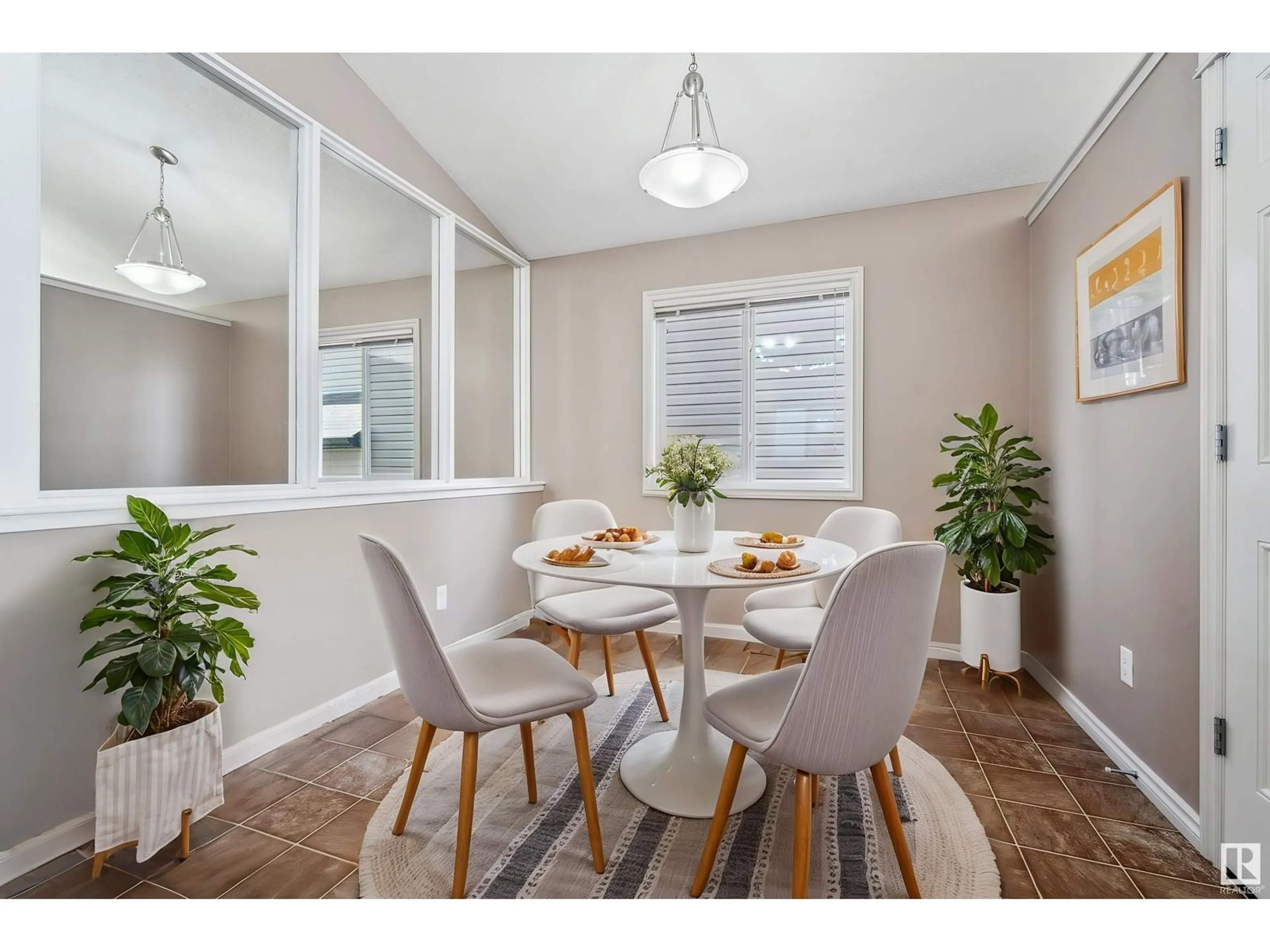 Dining room, wood/laminate floor for 1560 35 AV, Edmonton Alberta T6T0M9